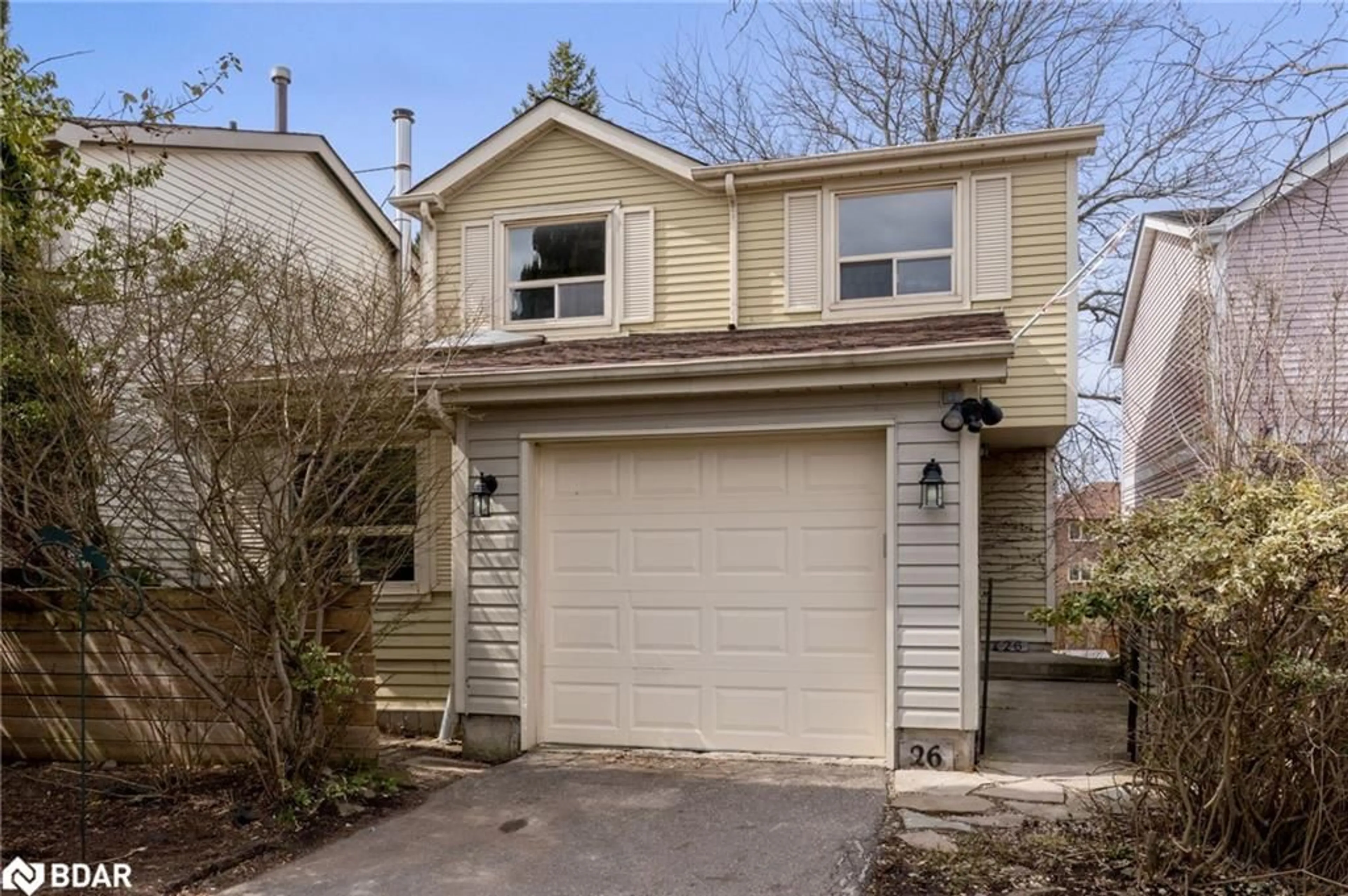 Home with vinyl exterior material, street for 26 Monterey Ave, Brampton Ontario L6Z 1B5