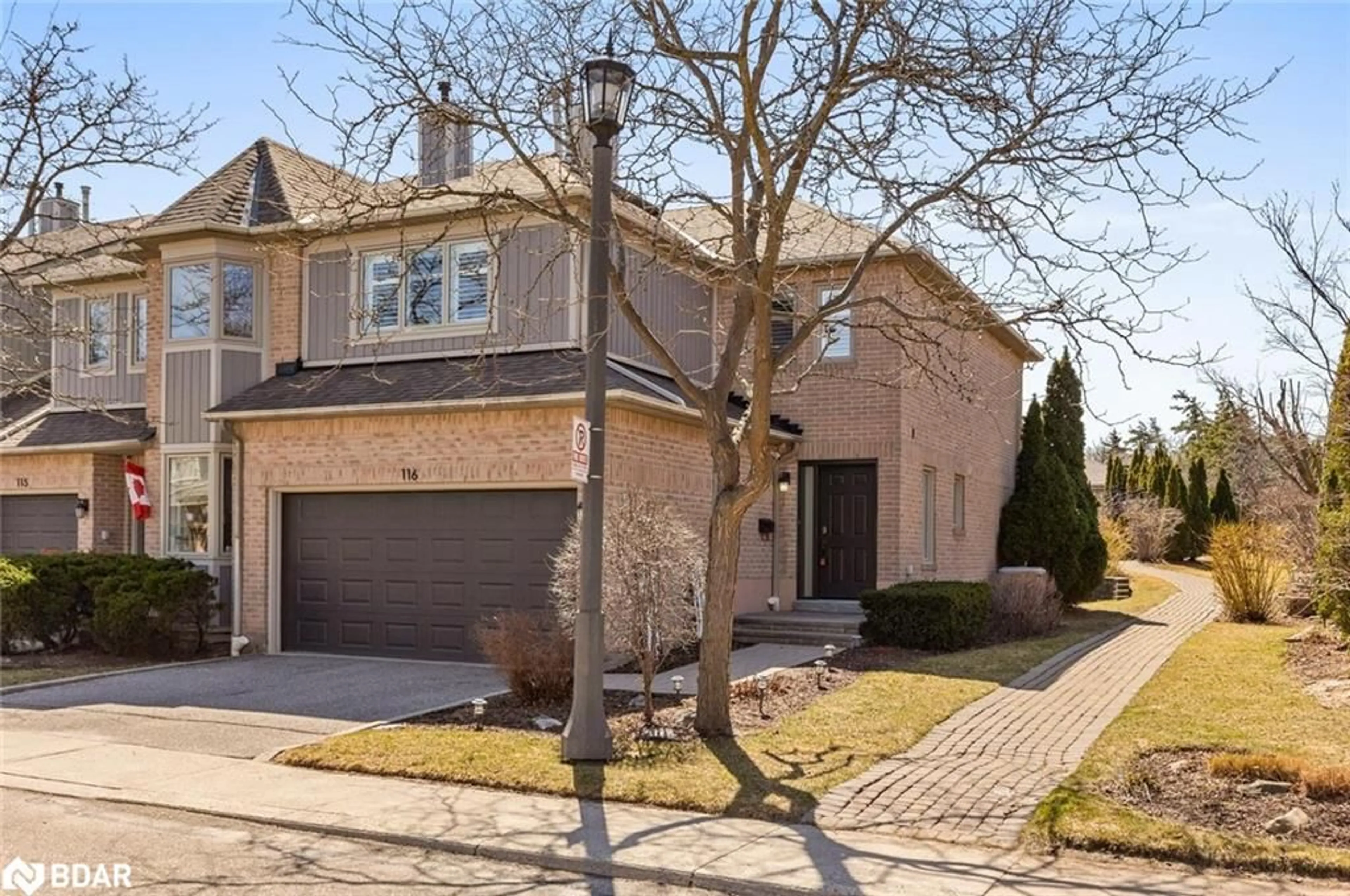 Home with brick exterior material, street for 5480 Glen Erin Dr #116, Mississauga Ontario L5M 5R3