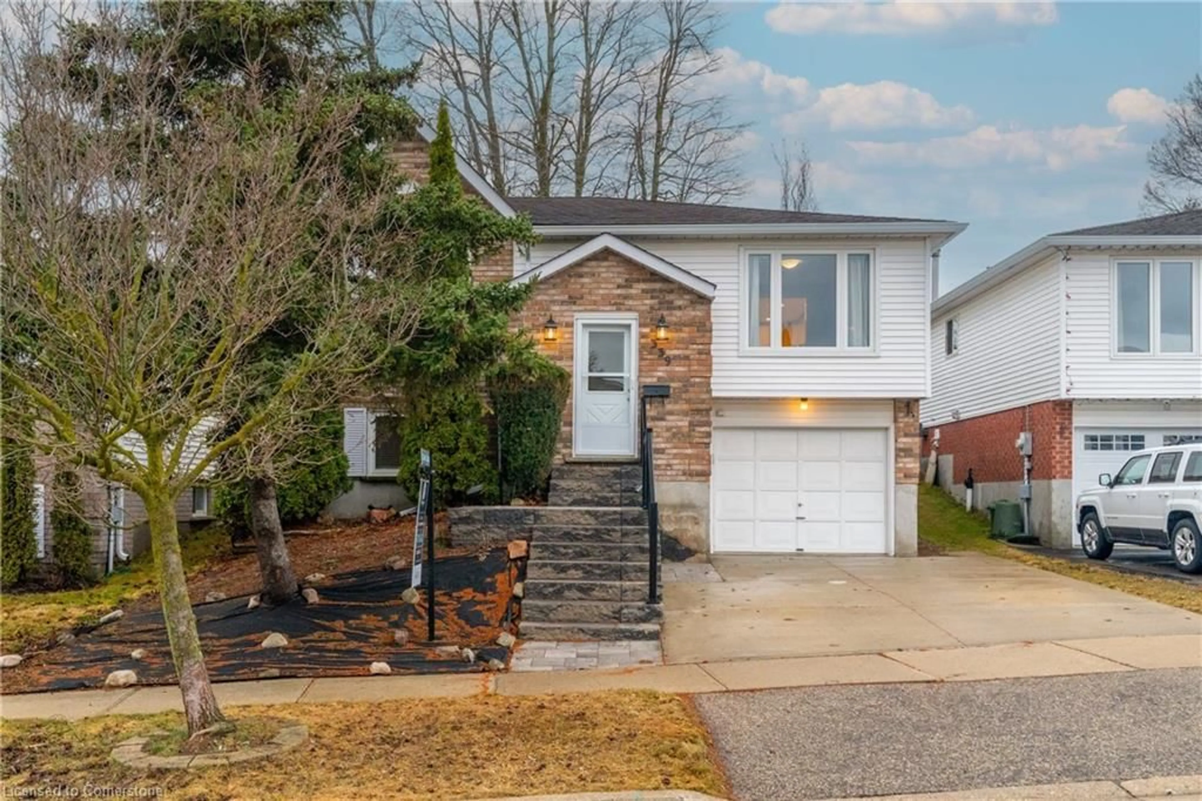 Home with vinyl exterior material, street for 339 Misty Cres, Kitchener Ontario N2B 3V5