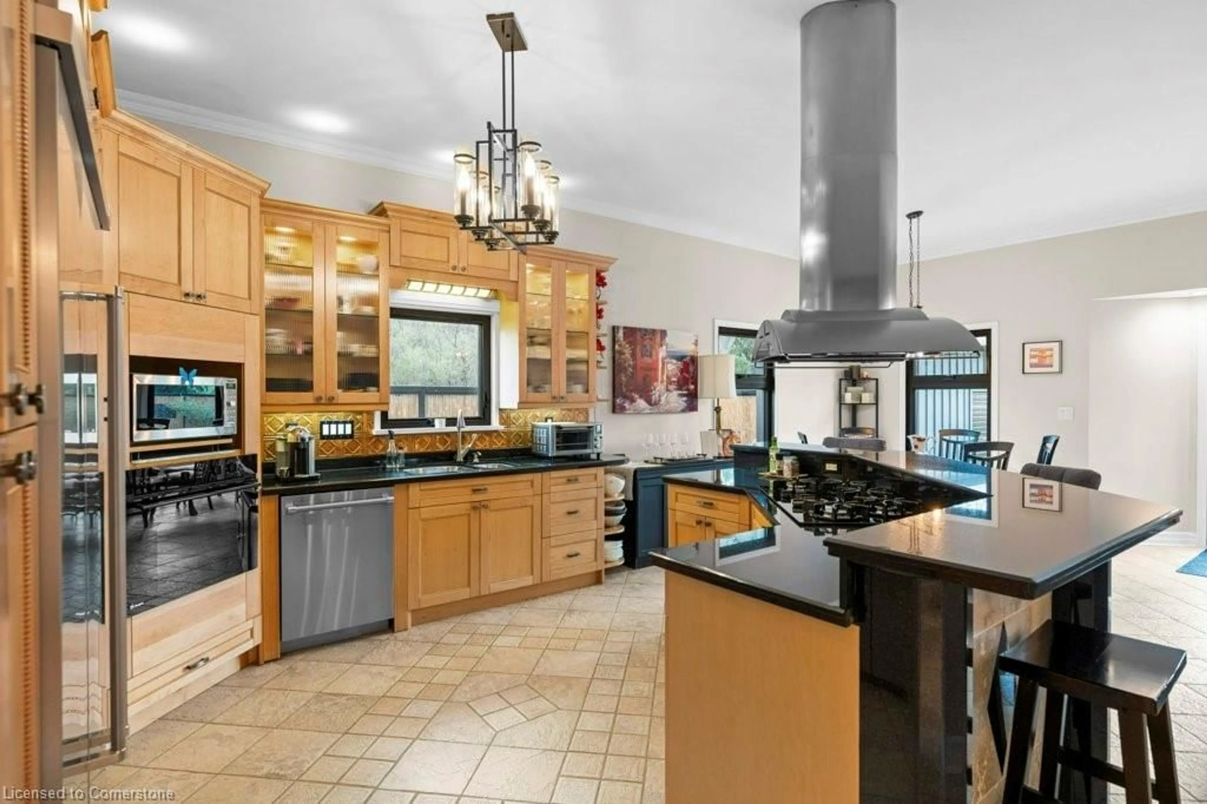 Open concept kitchen, ceramic/tile floor for 61 Lake Ave, Hamilton Ontario L8E 1L2