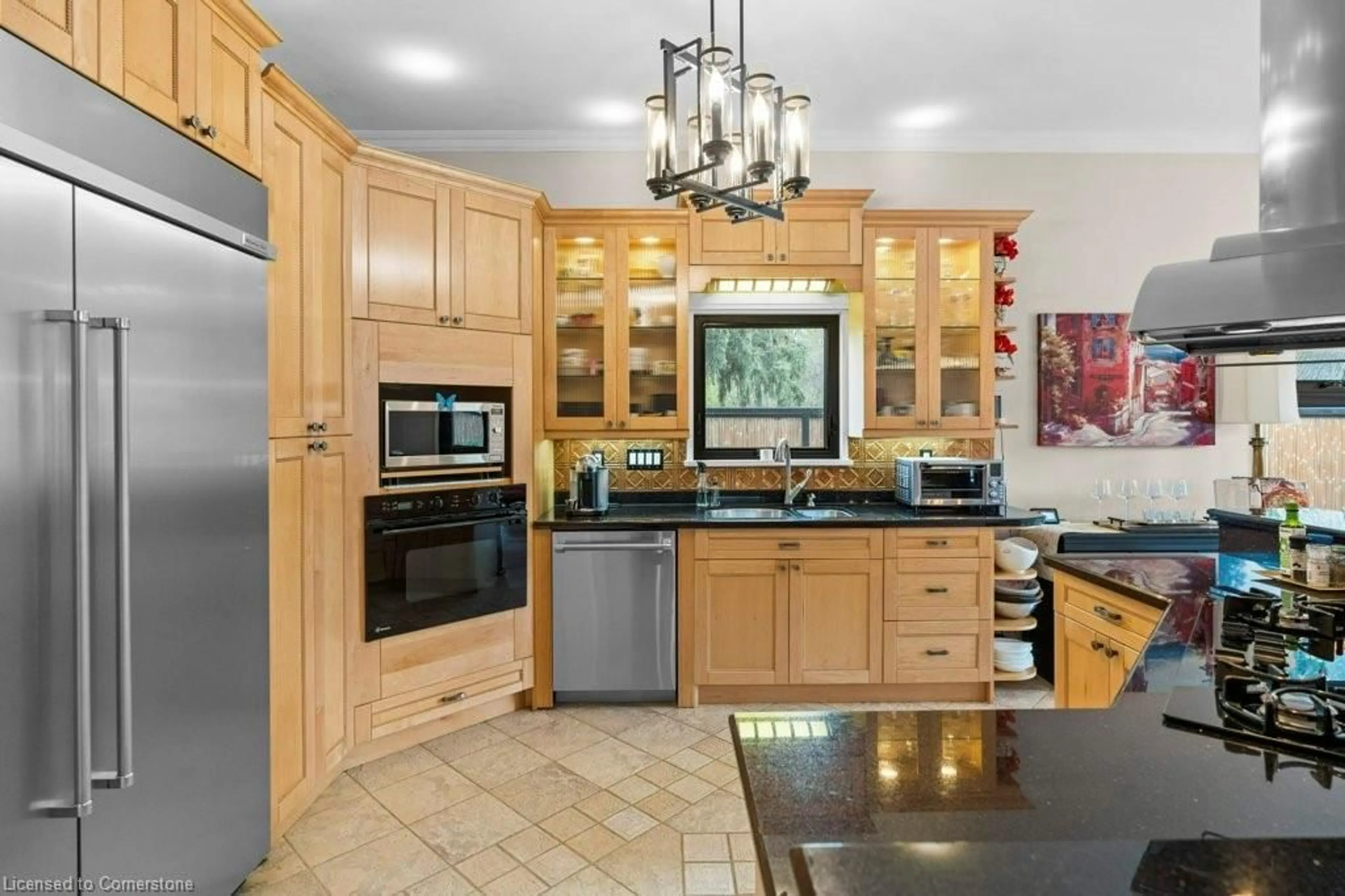Open concept kitchen, ceramic/tile floor for 61 Lake Ave, Hamilton Ontario L8E 1L2