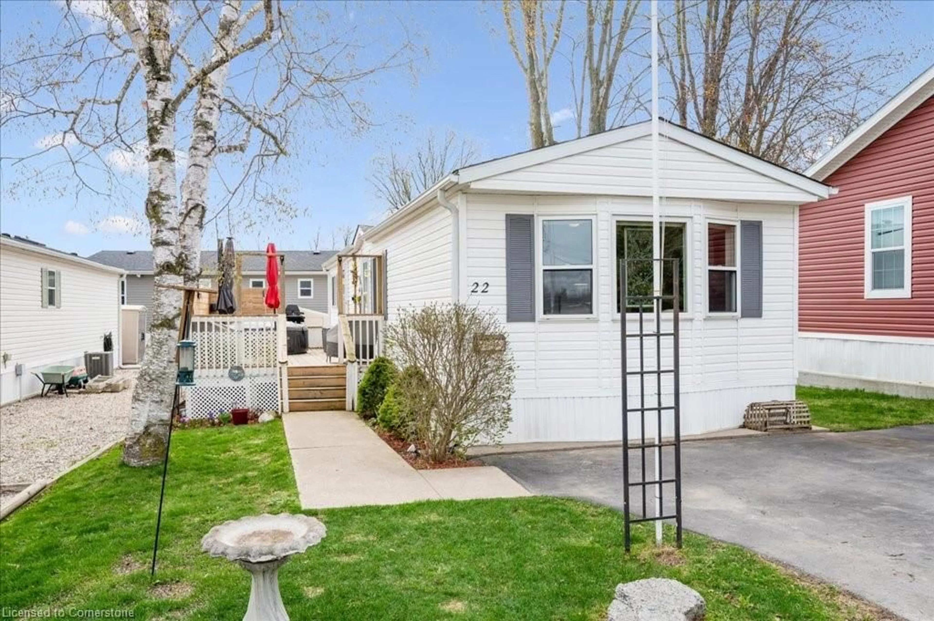 Home with vinyl exterior material, street for 22 Olympia Avenue Pvt, Puslinch Ontario N0B 2J0