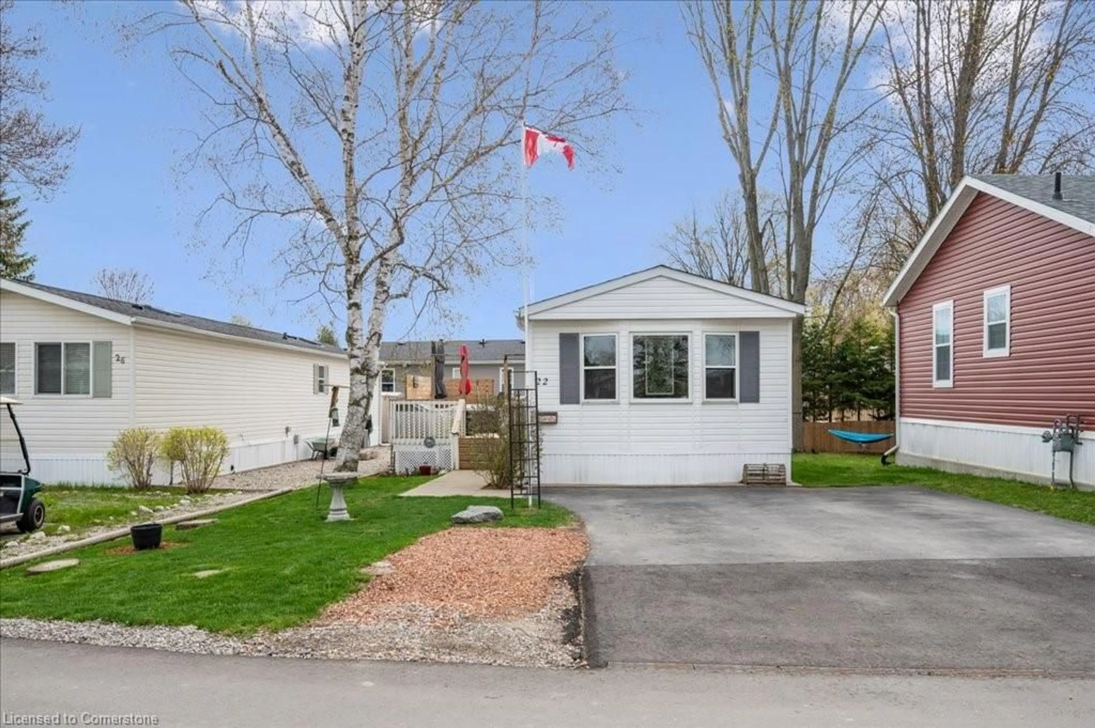 Home with vinyl exterior material, street for 22 Olympia Avenue Pvt, Puslinch Ontario N0B 2J0
