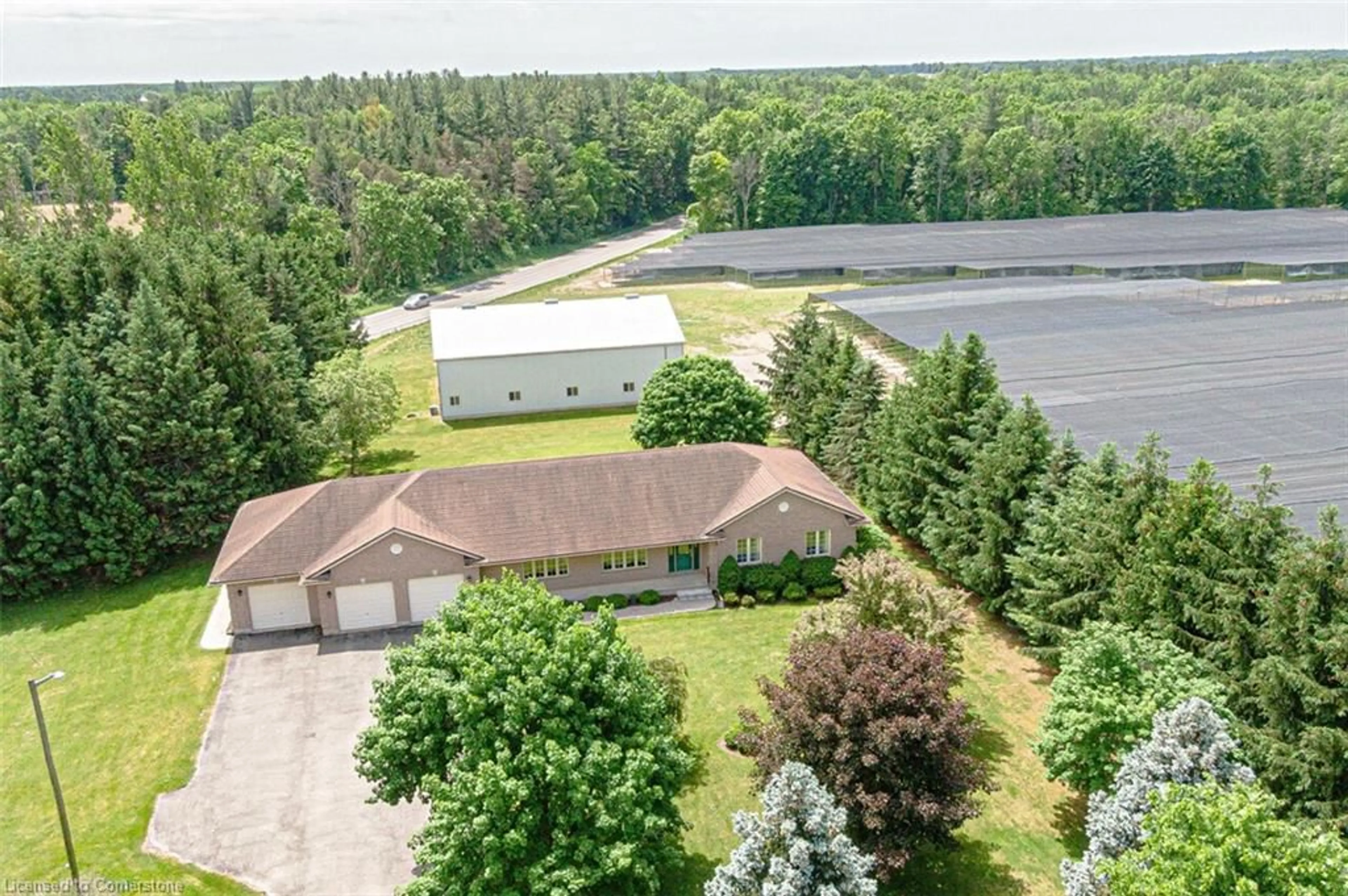 A pic from outside/outdoor area/front of a property/back of a property/a pic from drone, water/lake/river/ocean view for 1184 Windham 5 Rd, Vanessa Ontario N0E 1V0