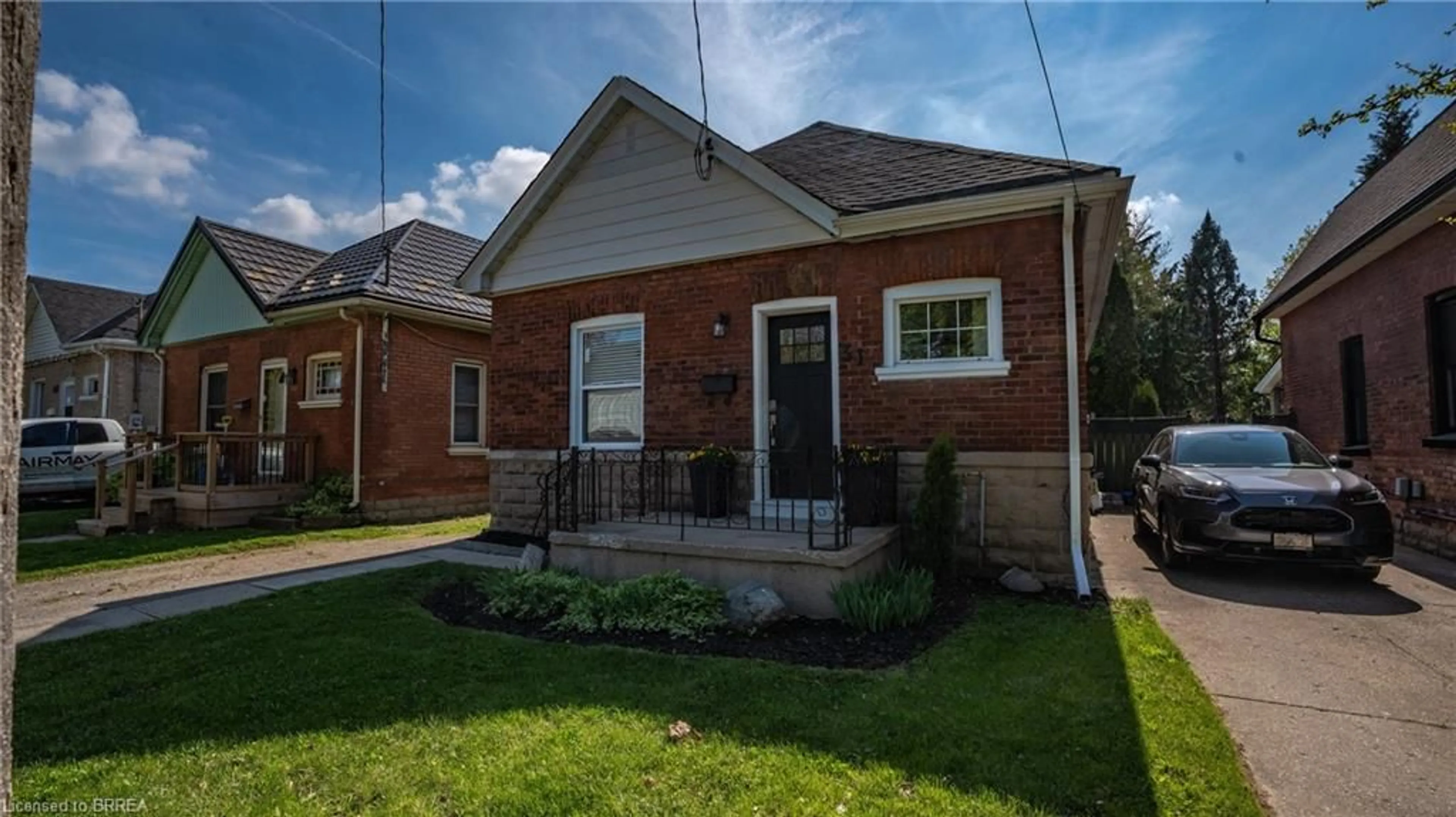 Home with brick exterior material, street for 31 Foster St, Brantford Ontario N3S 2A9