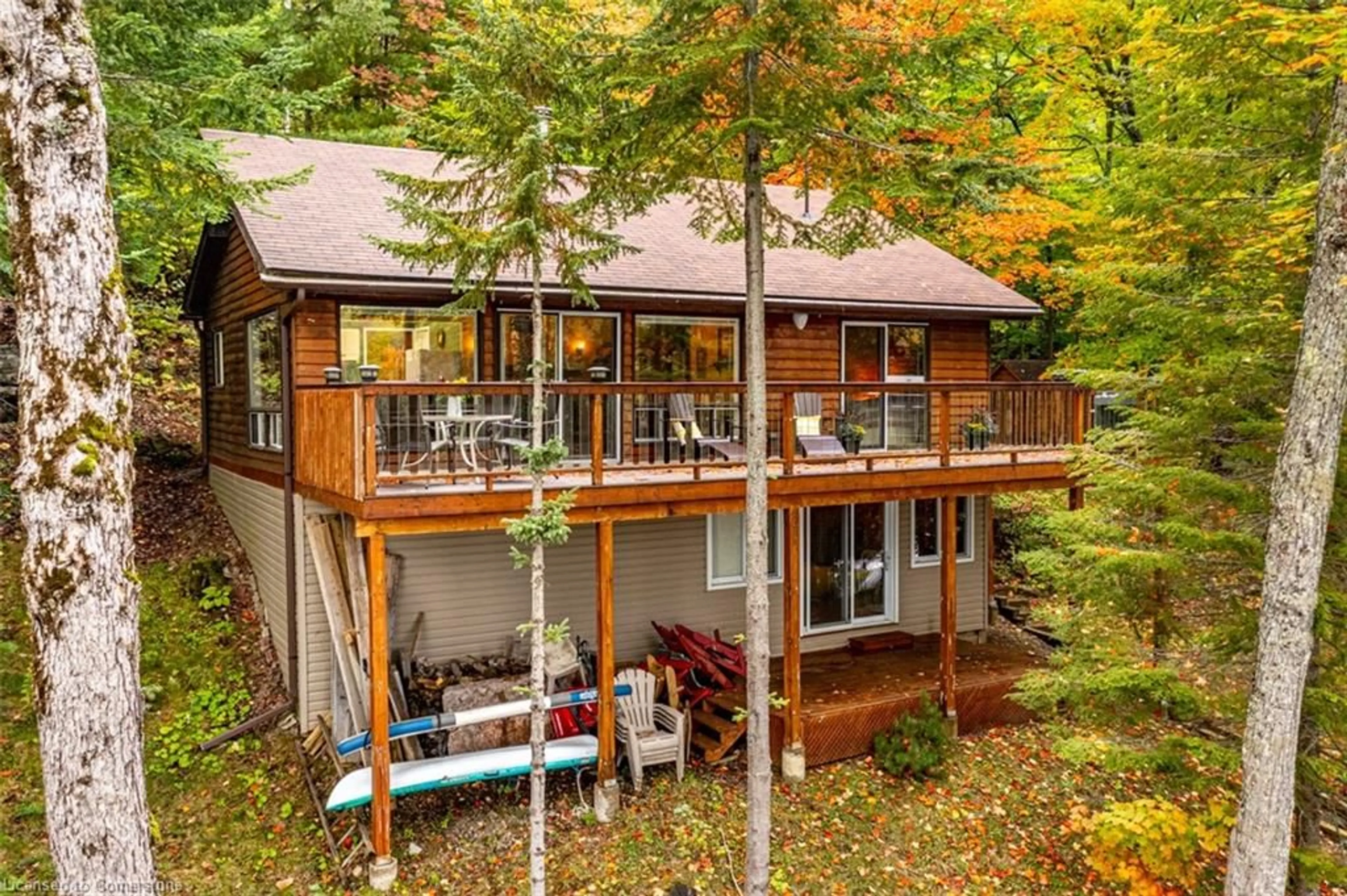 A pic from outside/outdoor area/front of a property/back of a property/a pic from drone, water/lake/river/ocean view for 1220 Portage Lake Rd, Dysart Ontario K0M 1S0