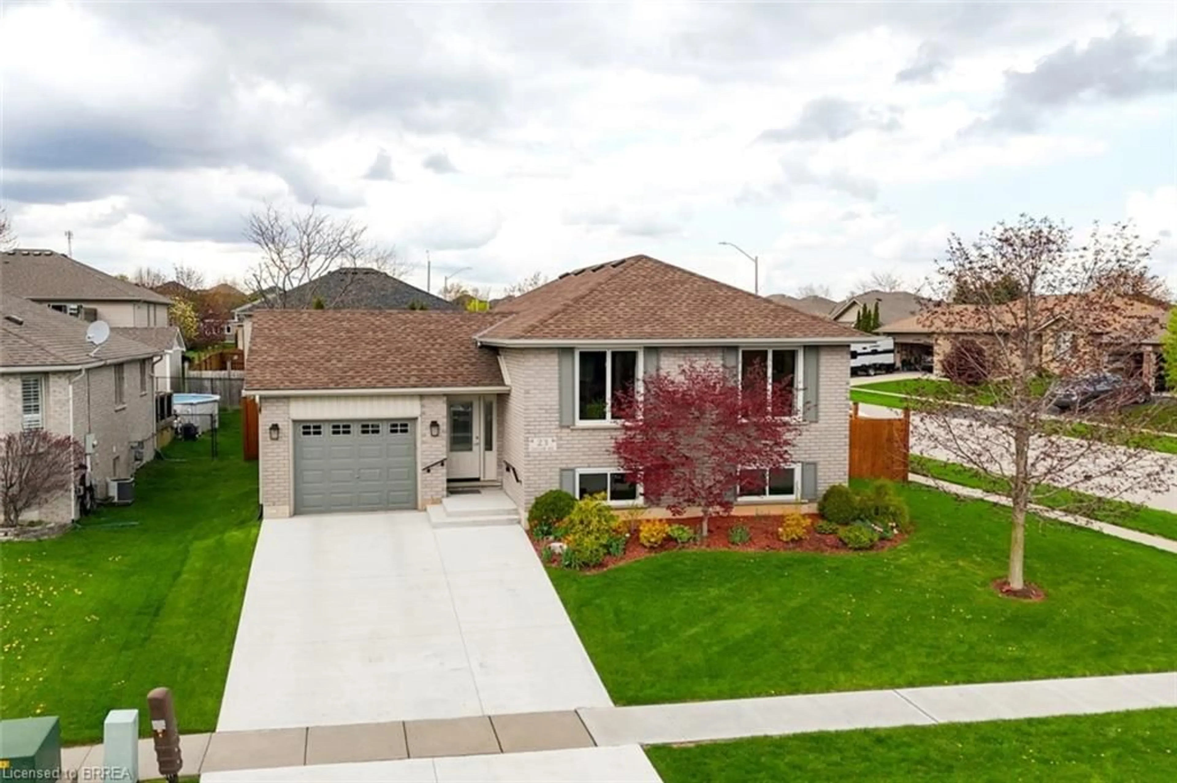 A pic from outside/outdoor area/front of a property/back of a property/a pic from drone, street for 23 Taylor Rd, St. George Ontario N0E 1N0