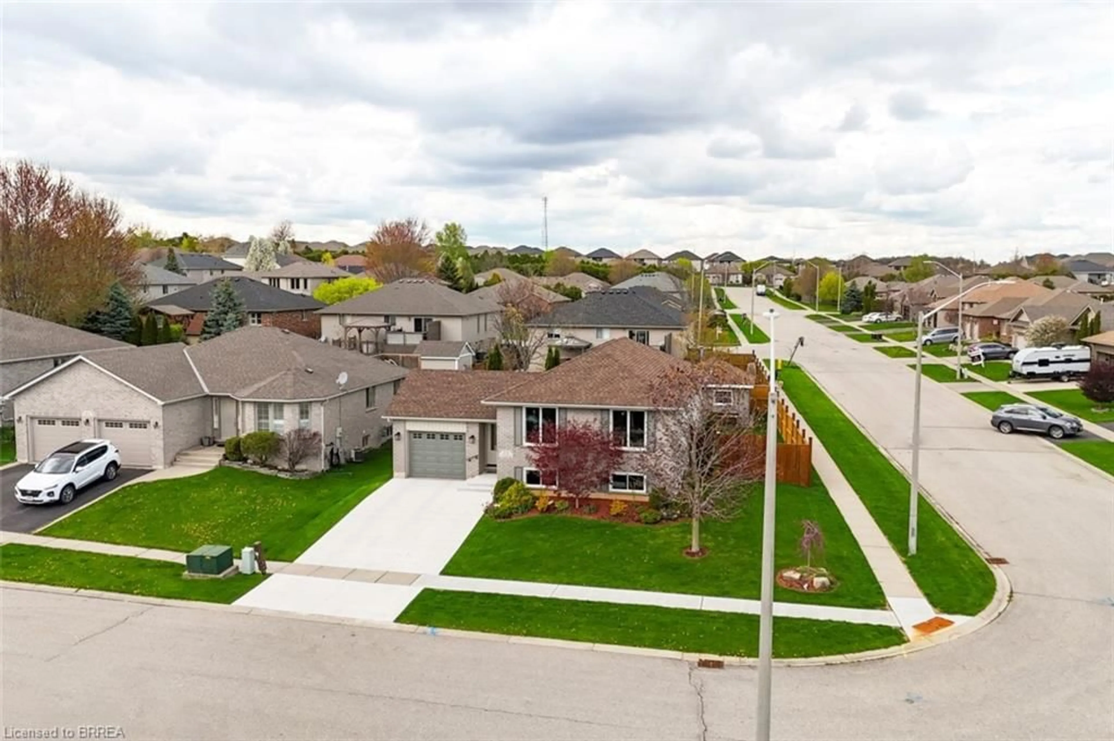 A pic from outside/outdoor area/front of a property/back of a property/a pic from drone, street for 23 Taylor Rd, St. George Ontario N0E 1N0