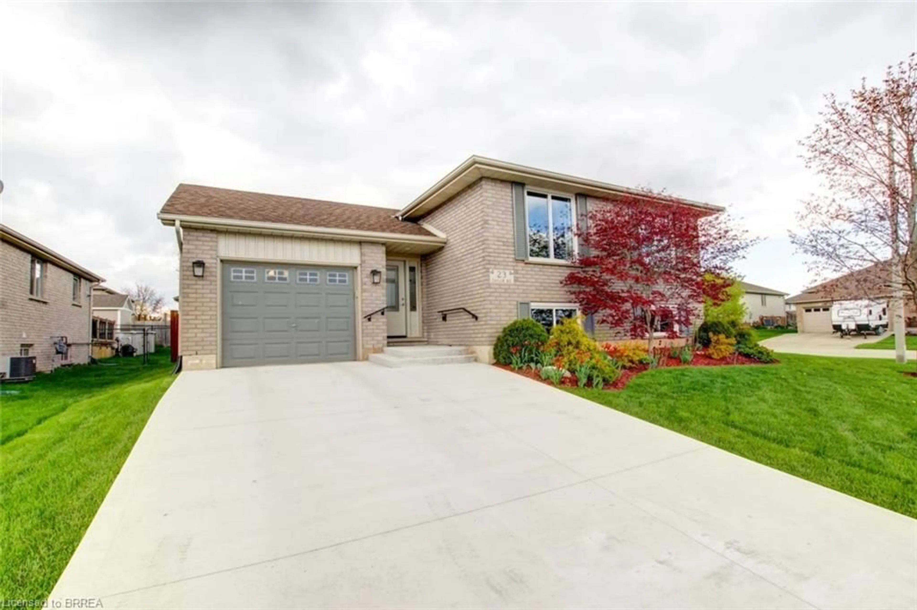 Home with vinyl exterior material, street for 23 Taylor Rd, St. George Ontario N0E 1N0