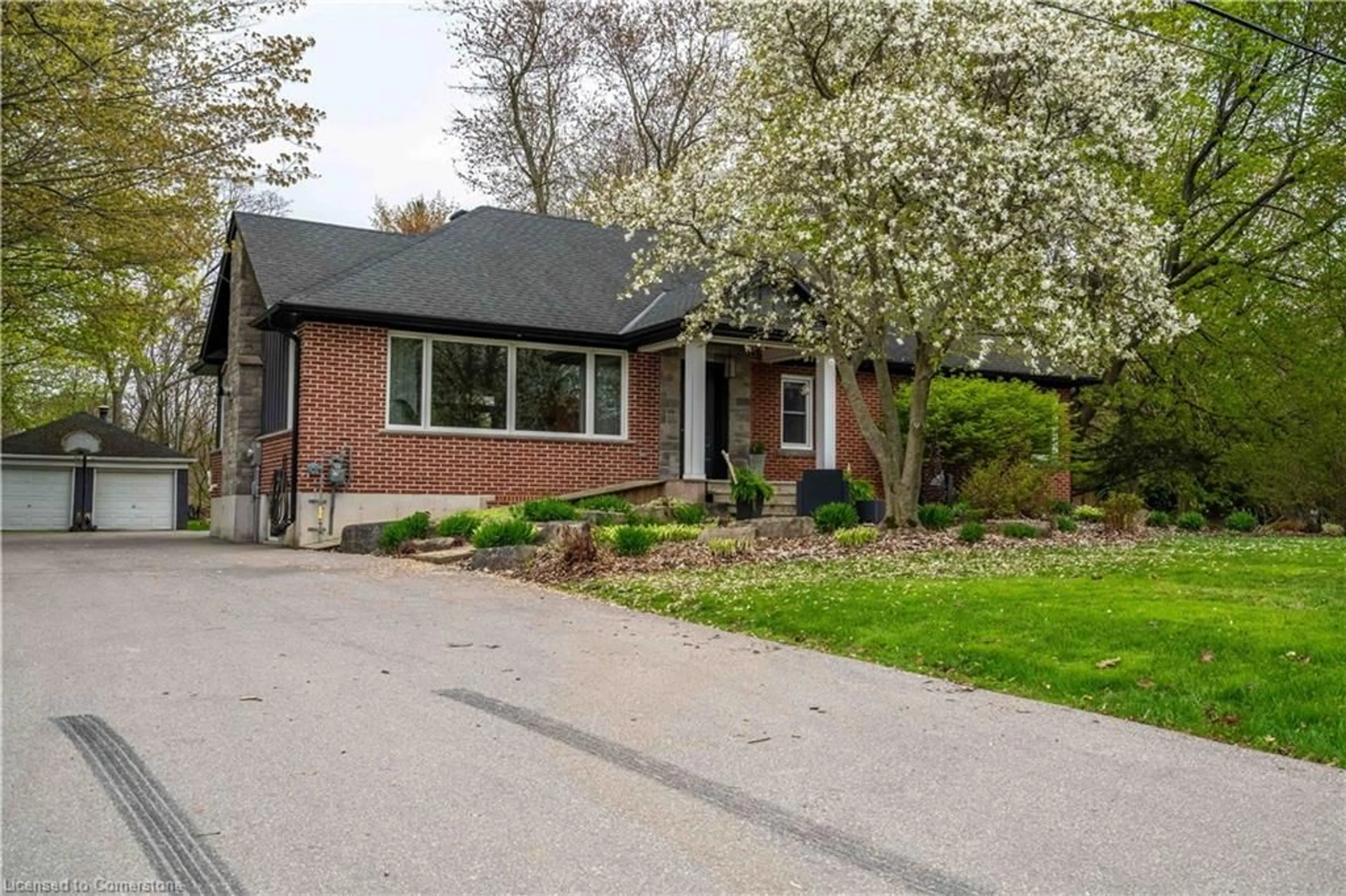 Home with brick exterior material, street for 298 Garner Rd, Ancaster Ontario L9G 3K9