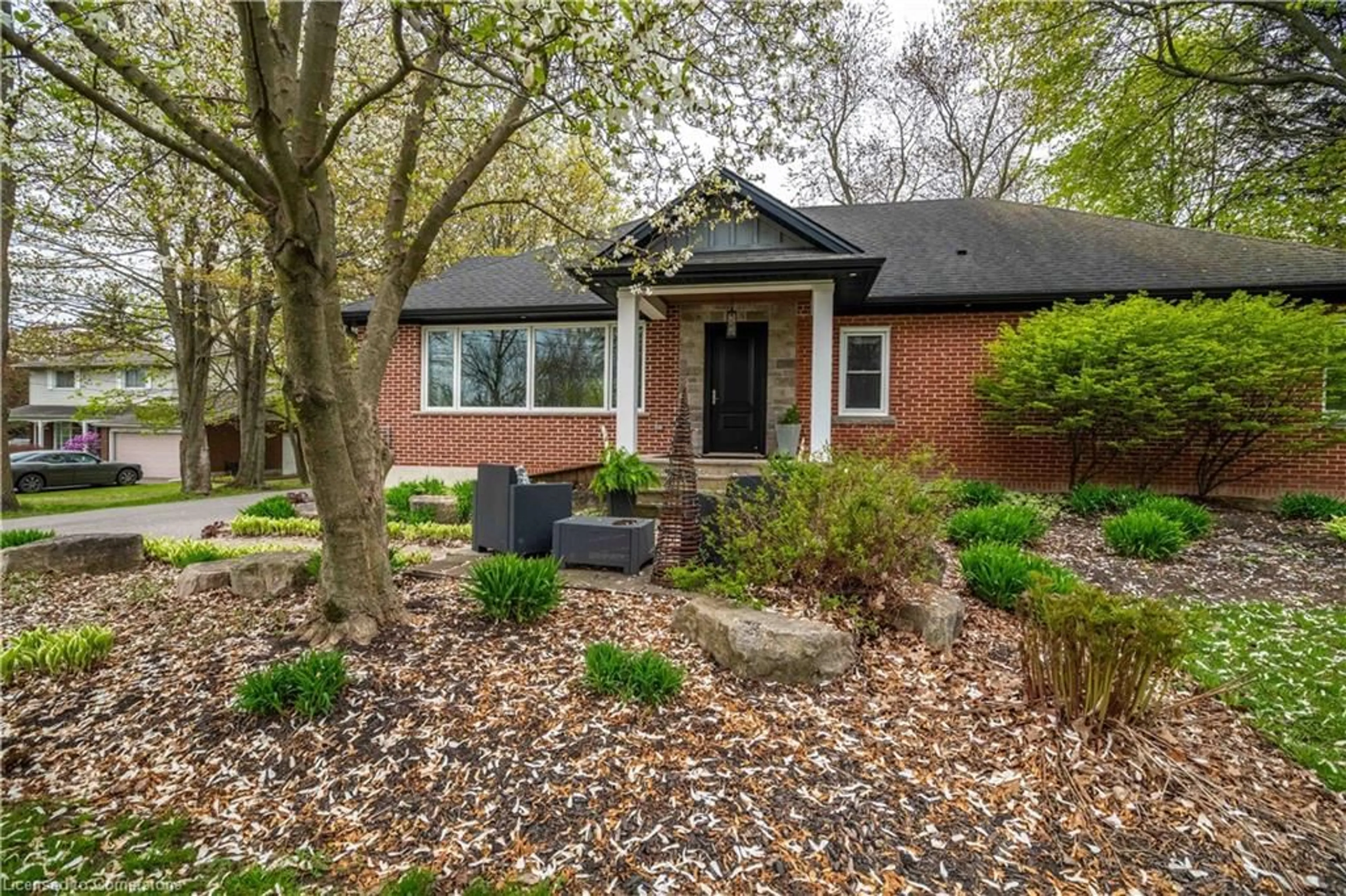 Home with brick exterior material, street for 298 Garner Rd, Ancaster Ontario L9G 3K9