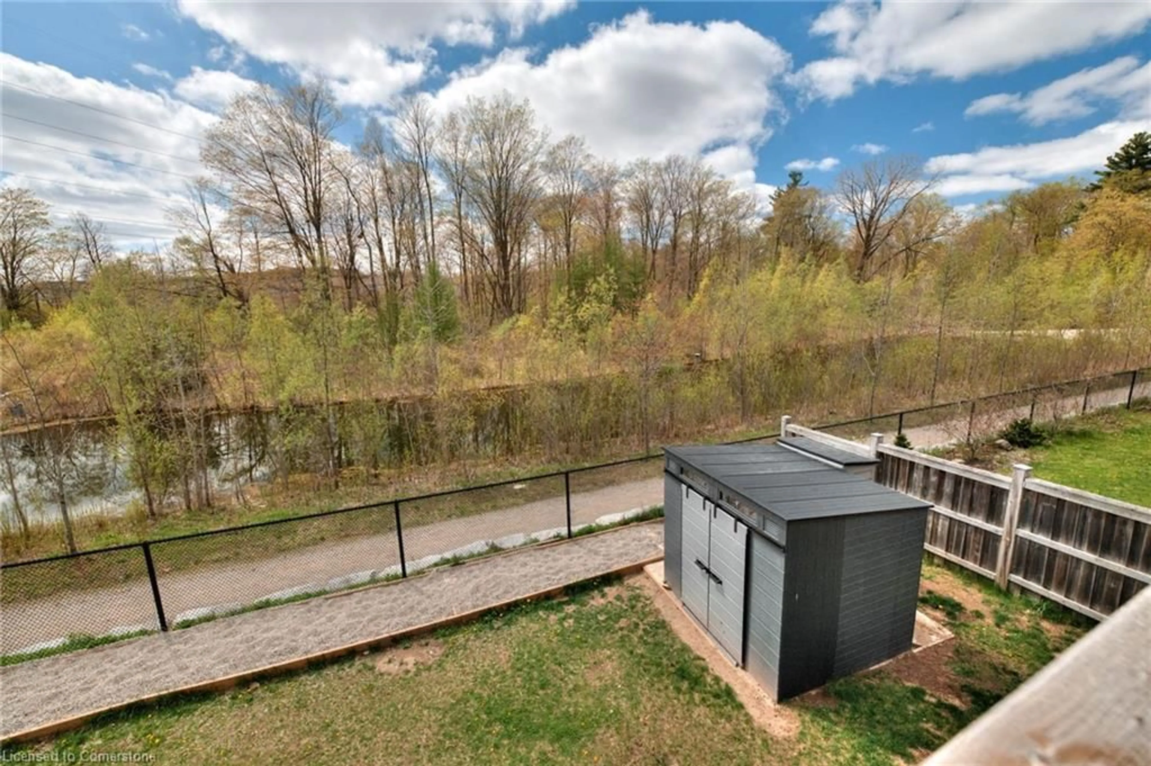 A pic from outside/outdoor area/front of a property/back of a property/a pic from drone, water/lake/river/ocean view for 288 Steepleridge St, Kitchener Ontario N2P 0B4