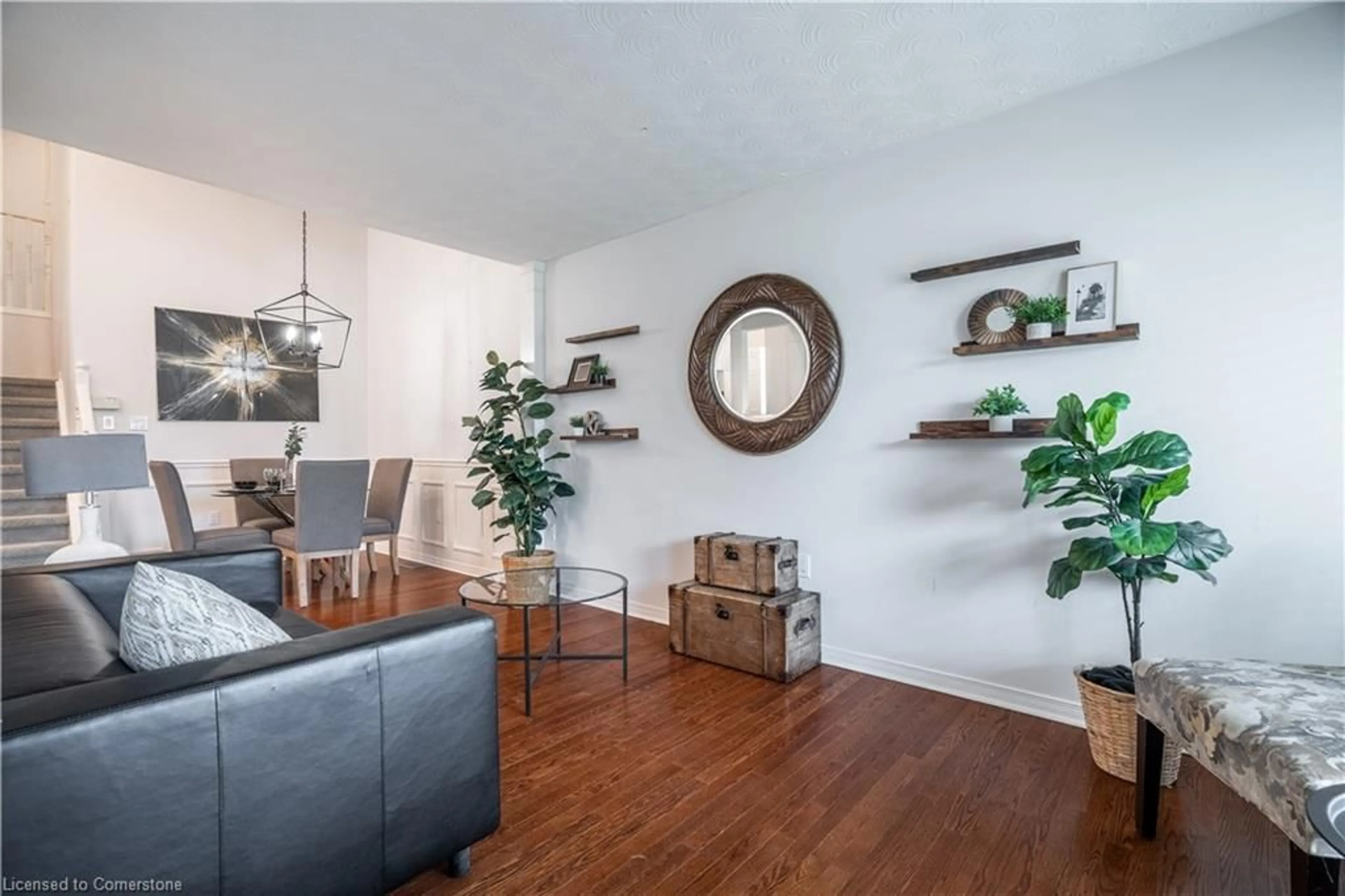 Living room with furniture, wood/laminate floor for 304 Acadia Dr, Hamilton Ontario L8W 3L1
