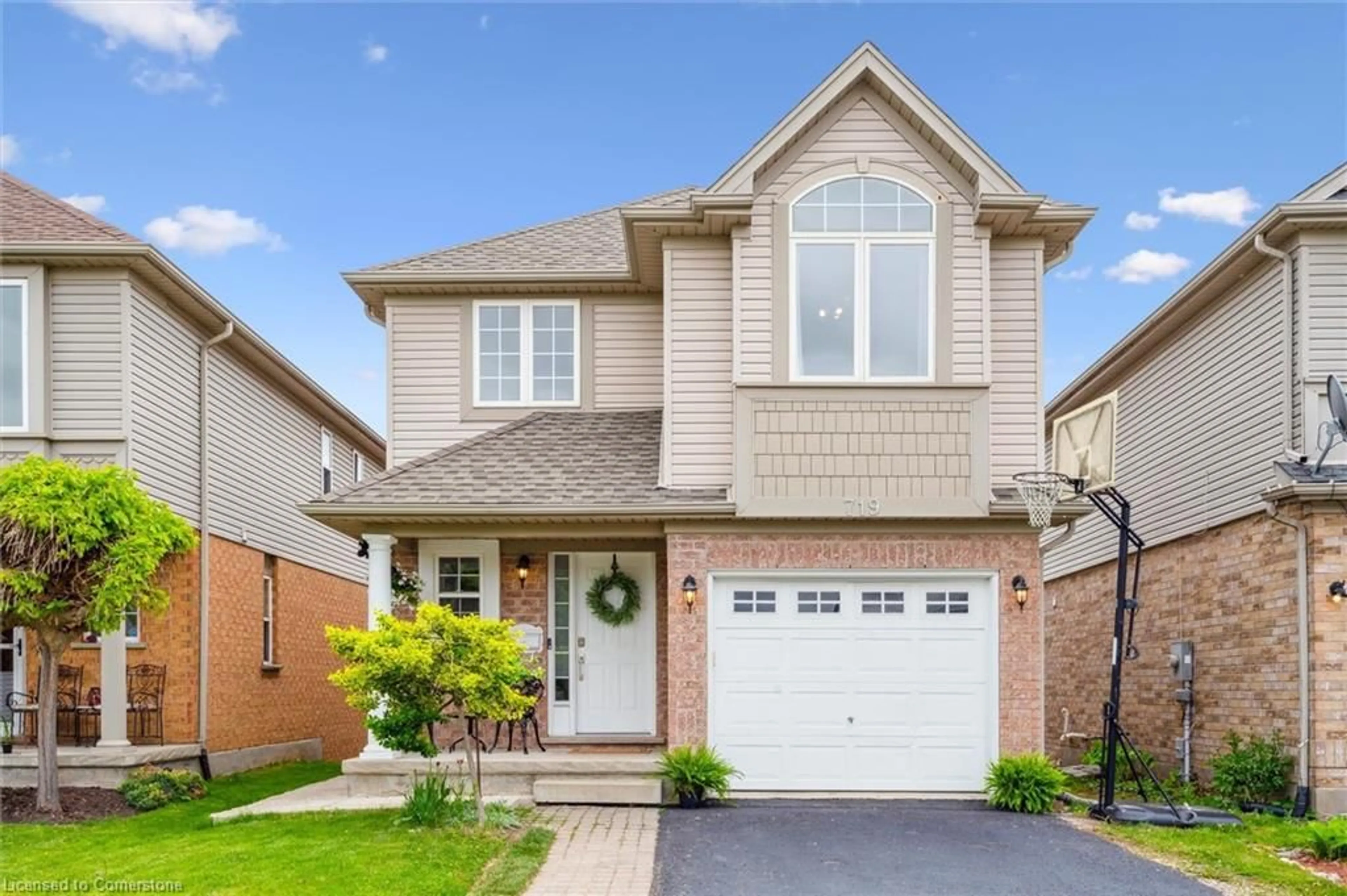 Home with brick exterior material, street for 719 Grand Banks Dr, Waterloo Ontario N2K 4M2