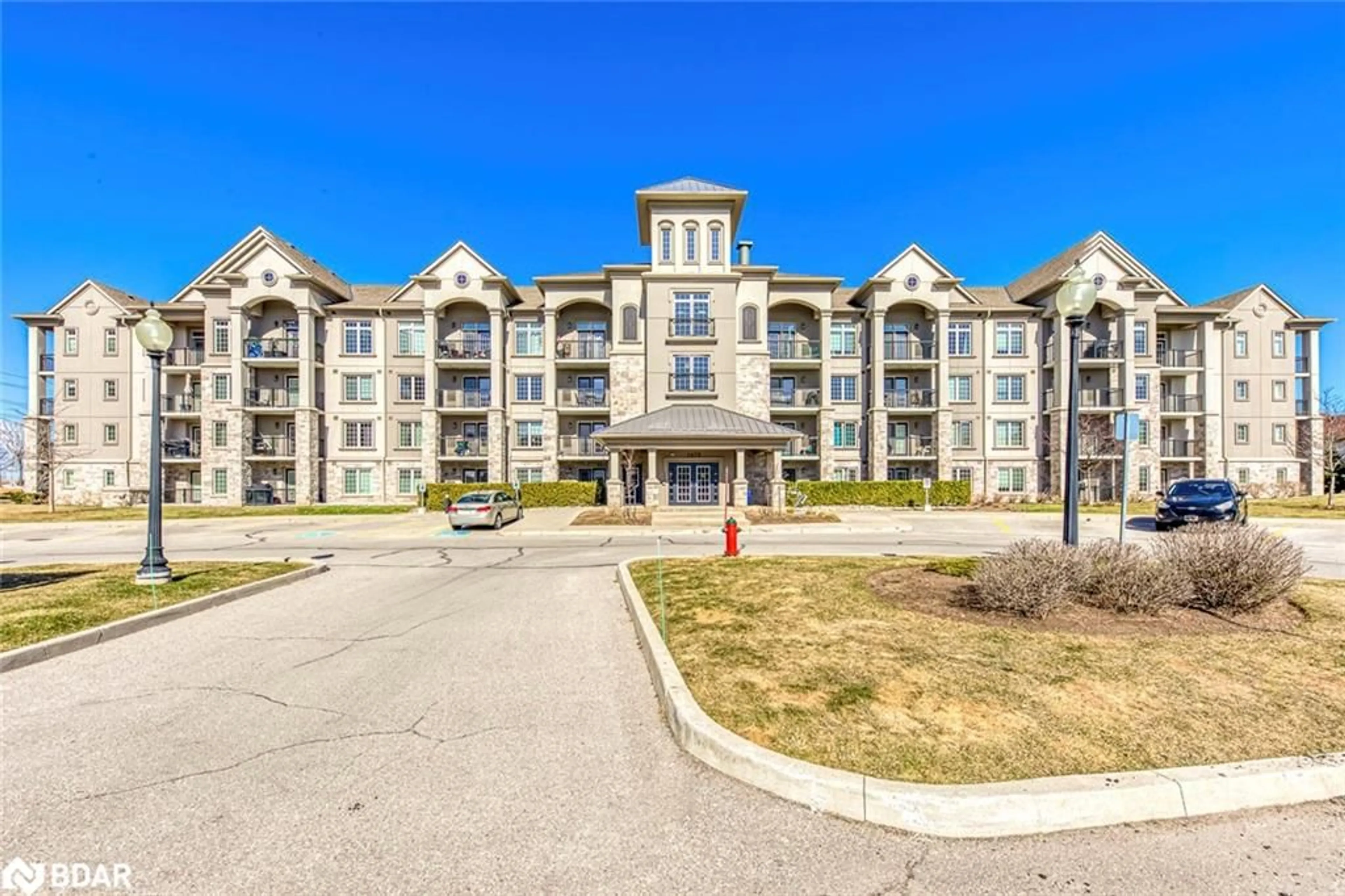 A pic from outside/outdoor area/front of a property/back of a property/a pic from drone, building for 1470 Main St #411, Milton Ontario L9T 8W6