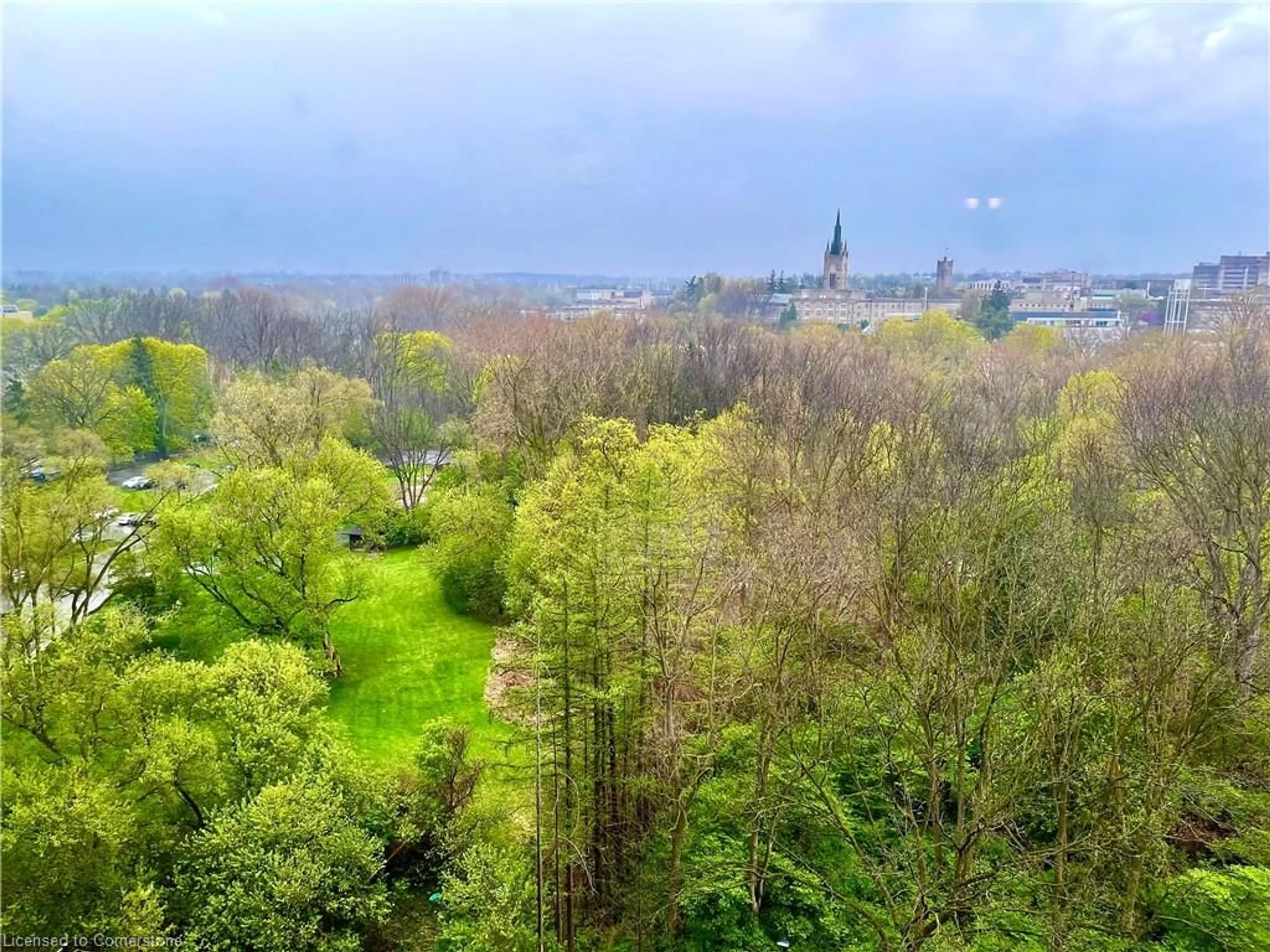 A pic from outside/outdoor area/front of a property/back of a property/a pic from drone, forest/trees view for 1235 Richmond St #1211, London Ontario N6A 0C1