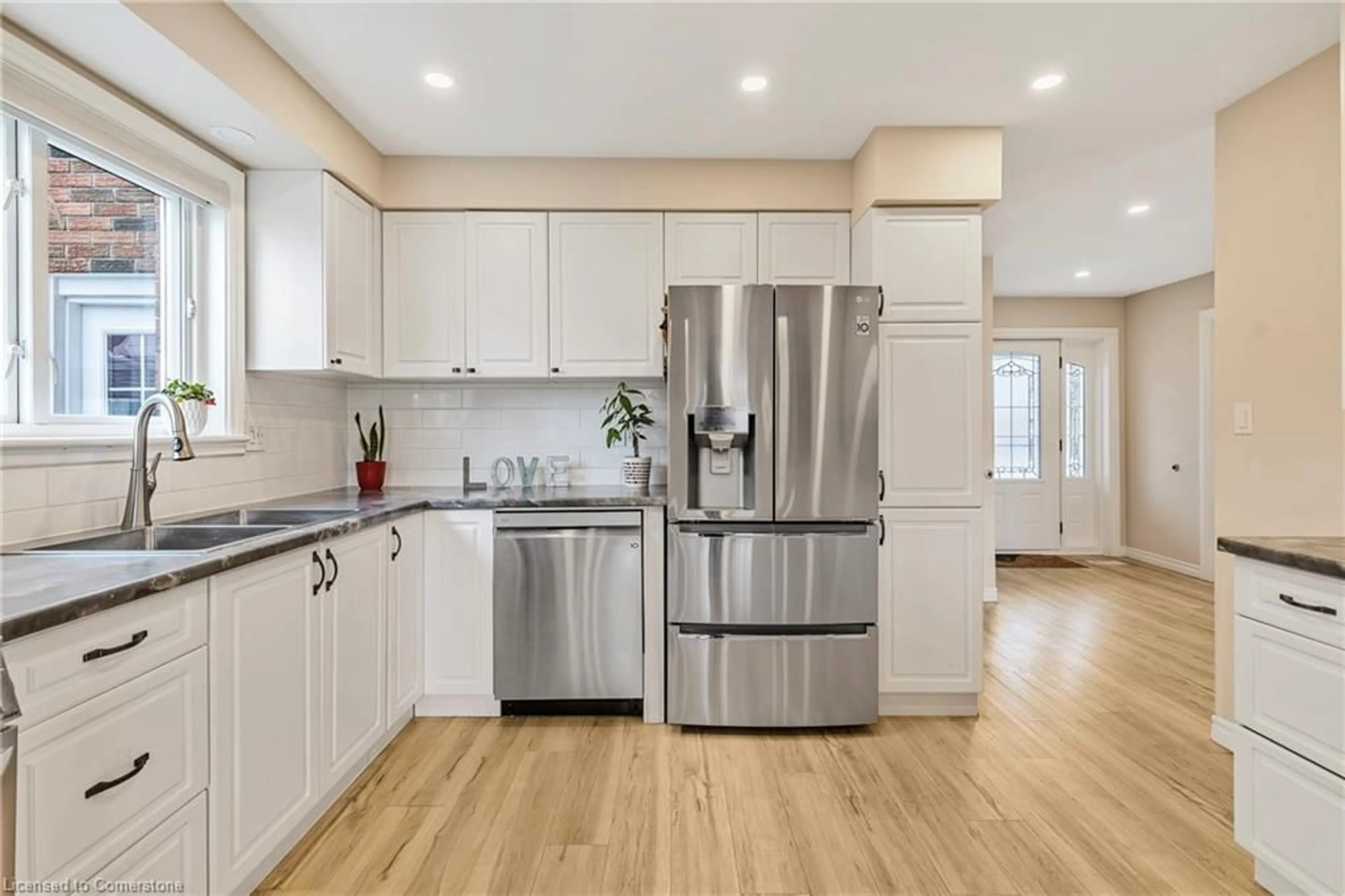 Open concept kitchen, unknown for 99 Pinewarbler Dr, Hamilton Ontario L9A 4Z5