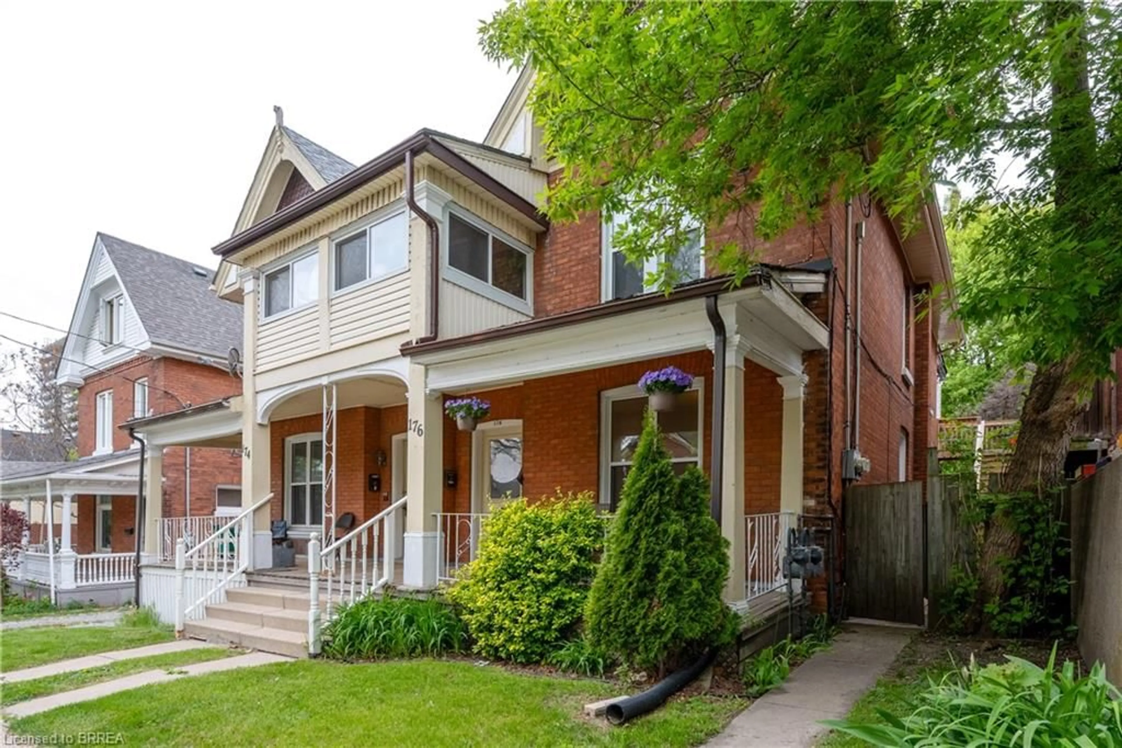 Home with brick exterior material, street for 174-176 Darling St, Brantford Ontario N3S 3W6
