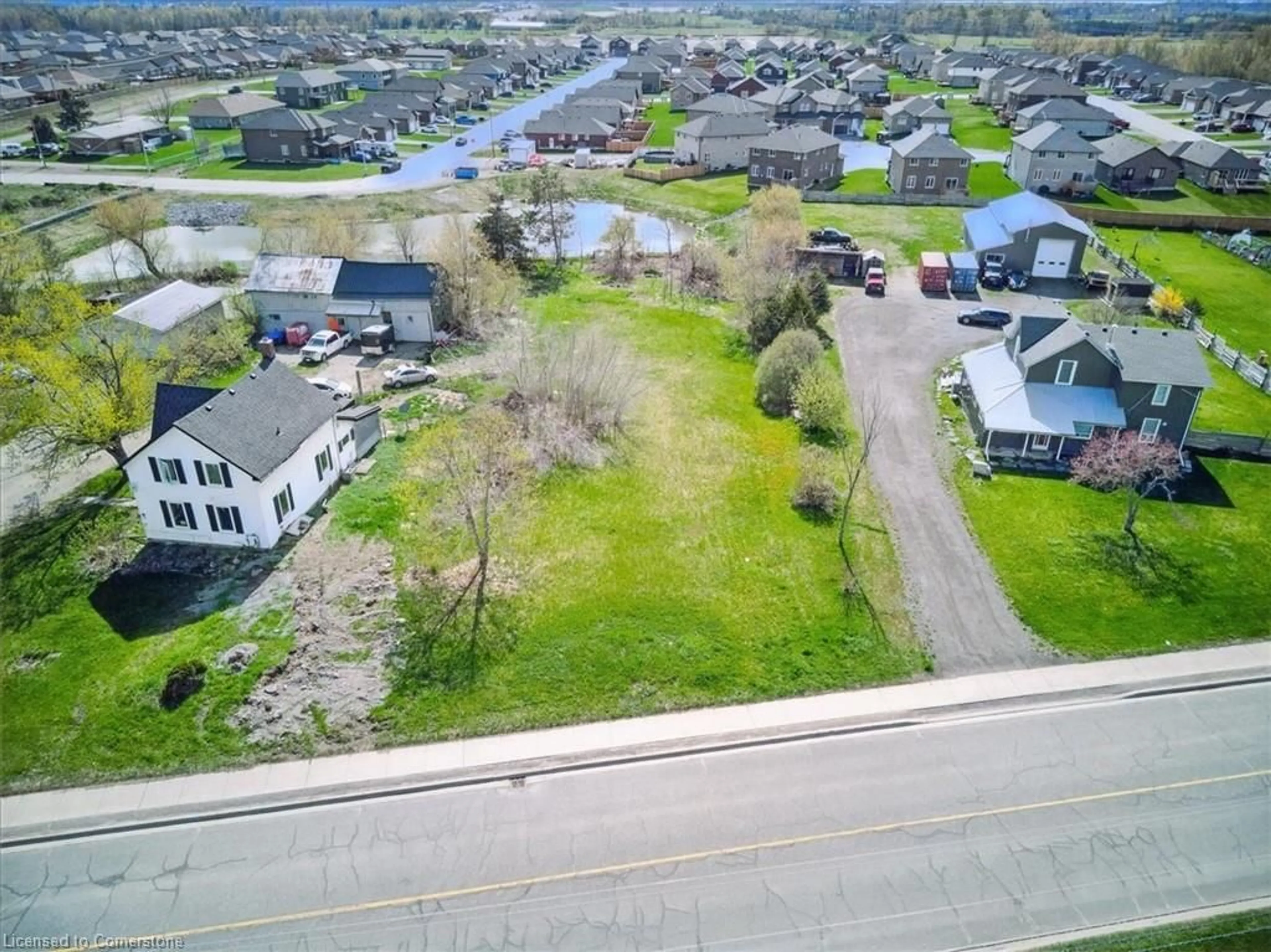 A pic from outside/outdoor area/front of a property/back of a property/a pic from drone, street for 130 County Rd 40 Rd, Asphodel-Norwood Twp Ontario K0L 2V0
