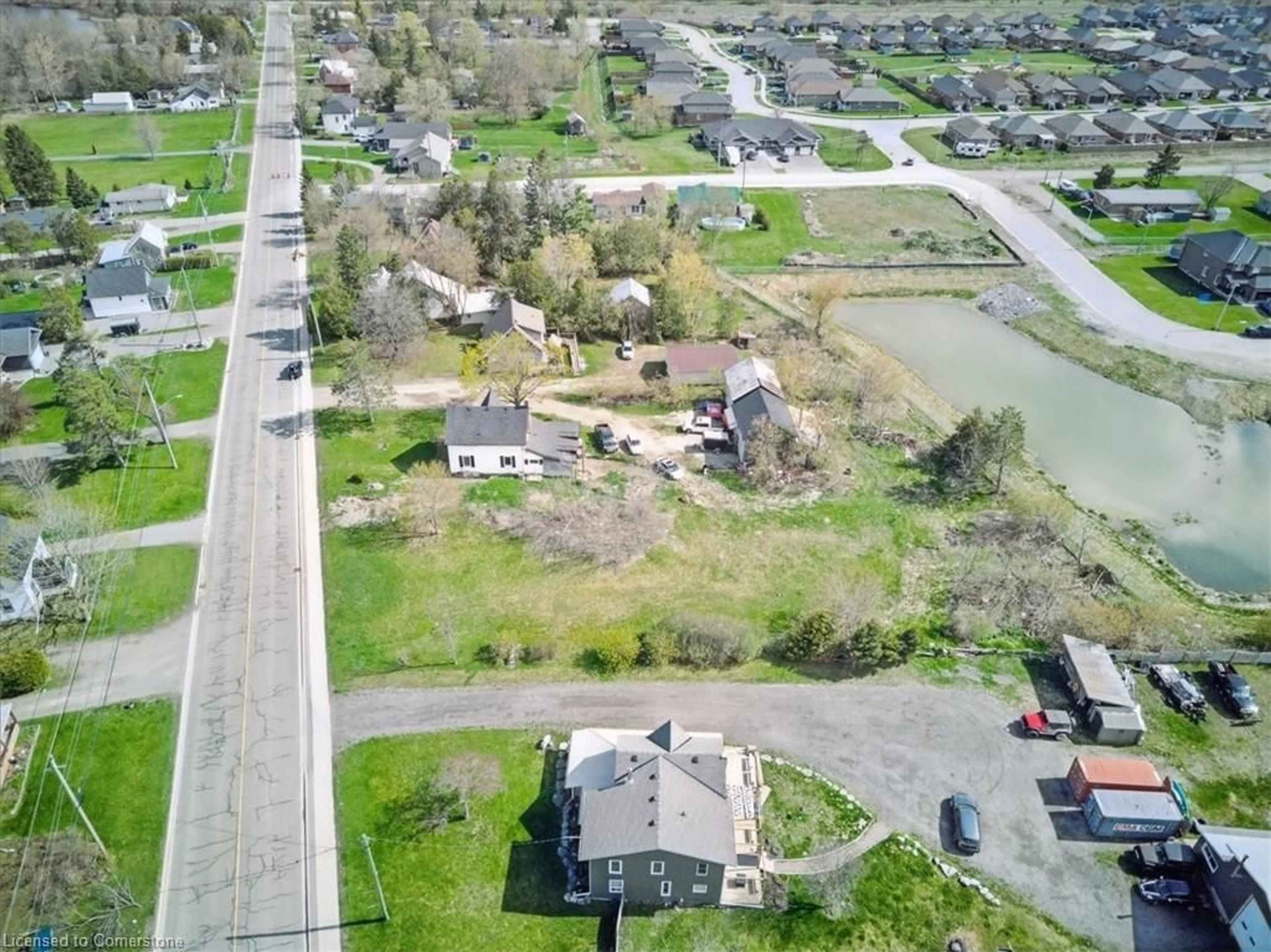 A pic from outside/outdoor area/front of a property/back of a property/a pic from drone, street for 130 County Rd 40 Rd, Asphodel-Norwood Twp Ontario K0L 2V0