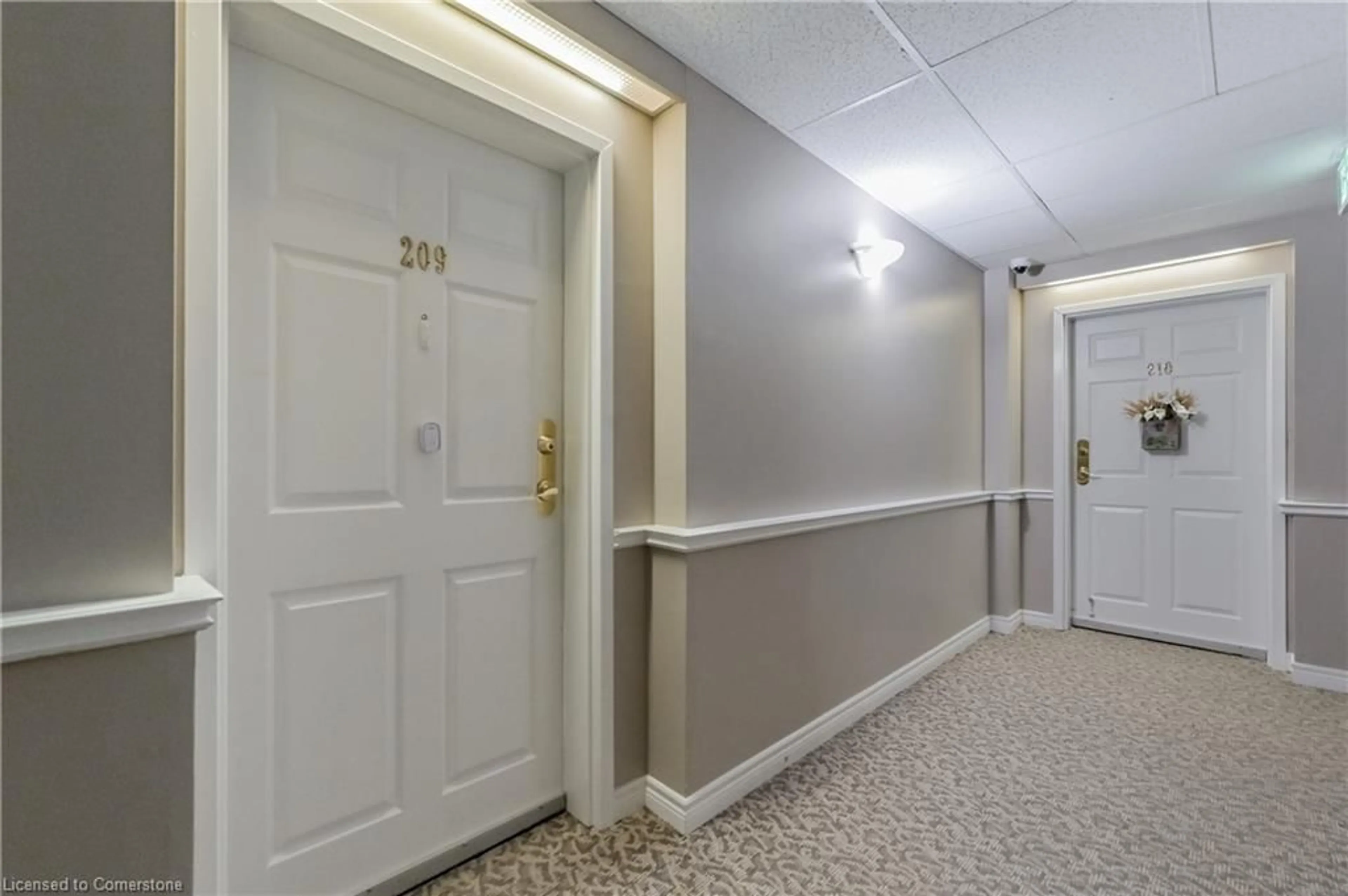 Indoor foyer for 20 Station Square #209, Elora Ontario N0B 1S0