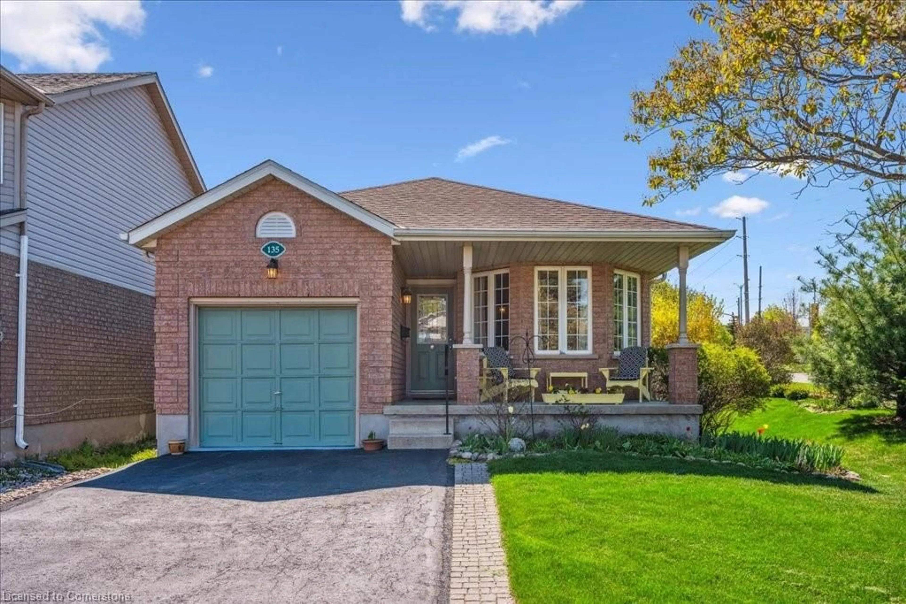 Home with brick exterior material, street for 135 Doyle Dr, Guelph Ontario N1G 5B4