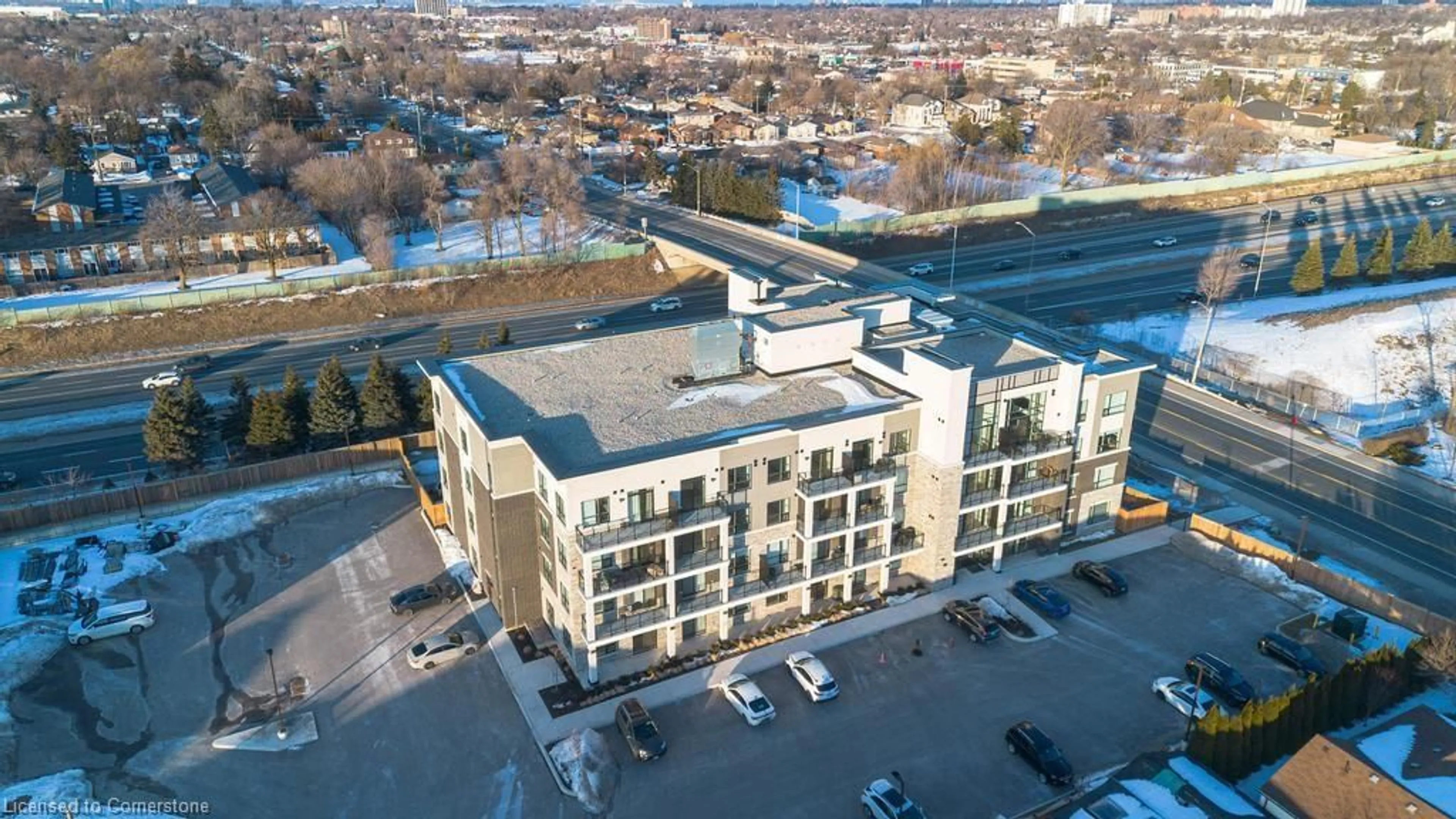 A pic from outside/outdoor area/front of a property/back of a property/a pic from drone, building for 120 Springvalley Cres #404, Hamilton Ontario L9C 0E4