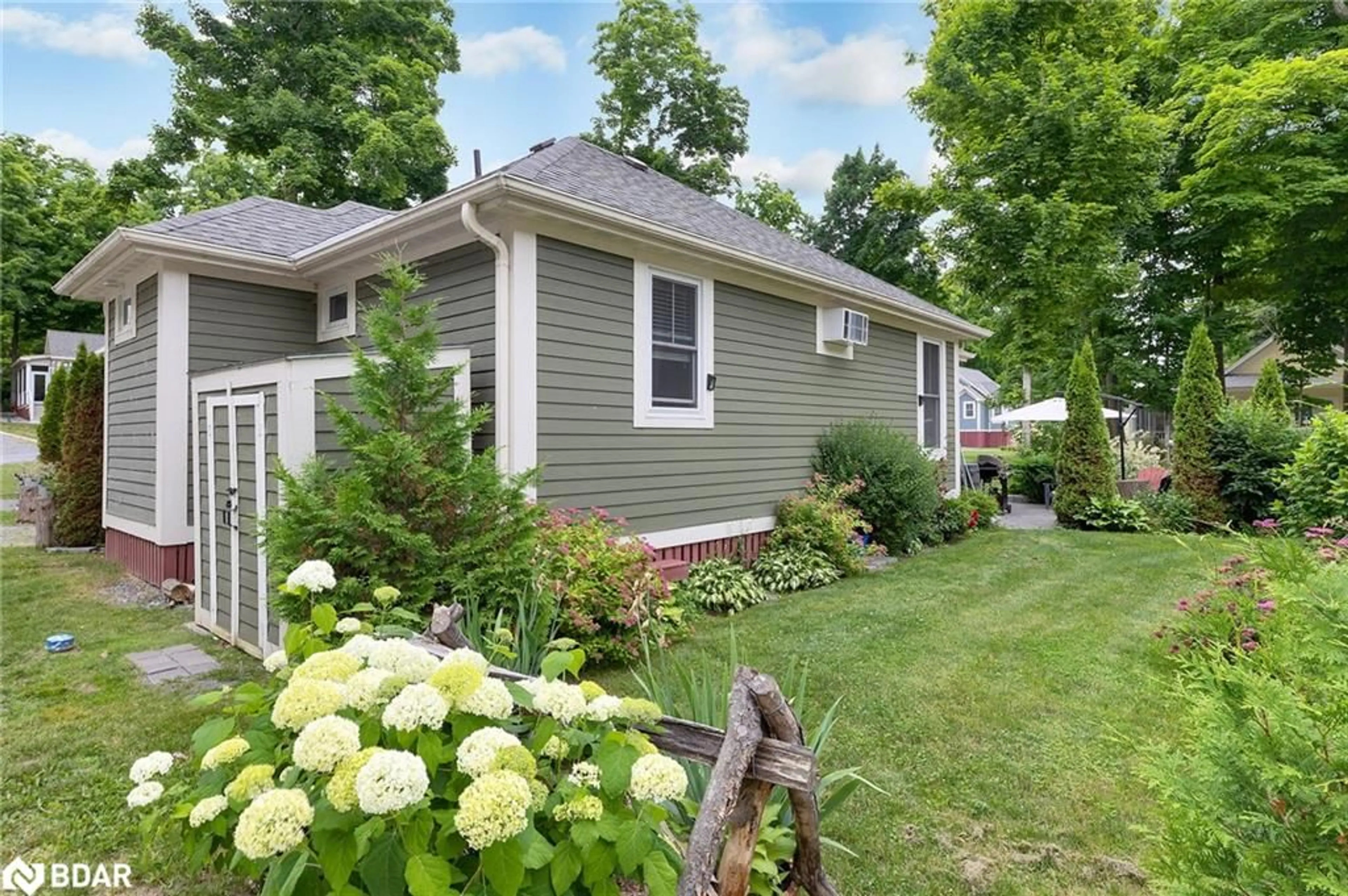 Home with vinyl exterior material, street for 7 Hollow Lane, Cherry Valley Ontario K0K 1P0