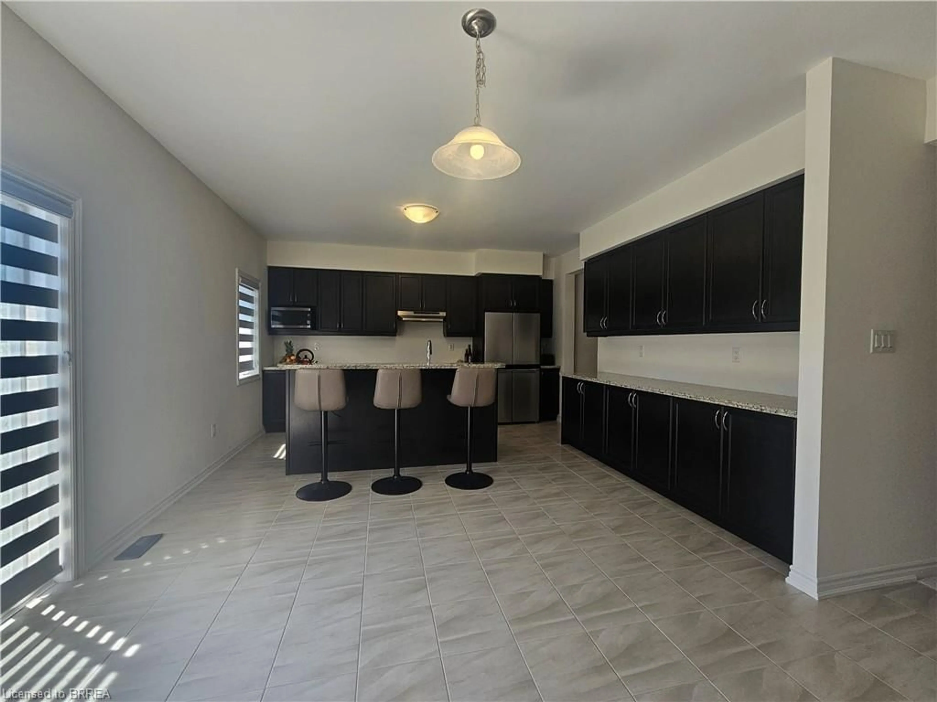 Open concept kitchen, ceramic/tile floor for 28 Rowley St, Brantford Ontario N3S 0J6