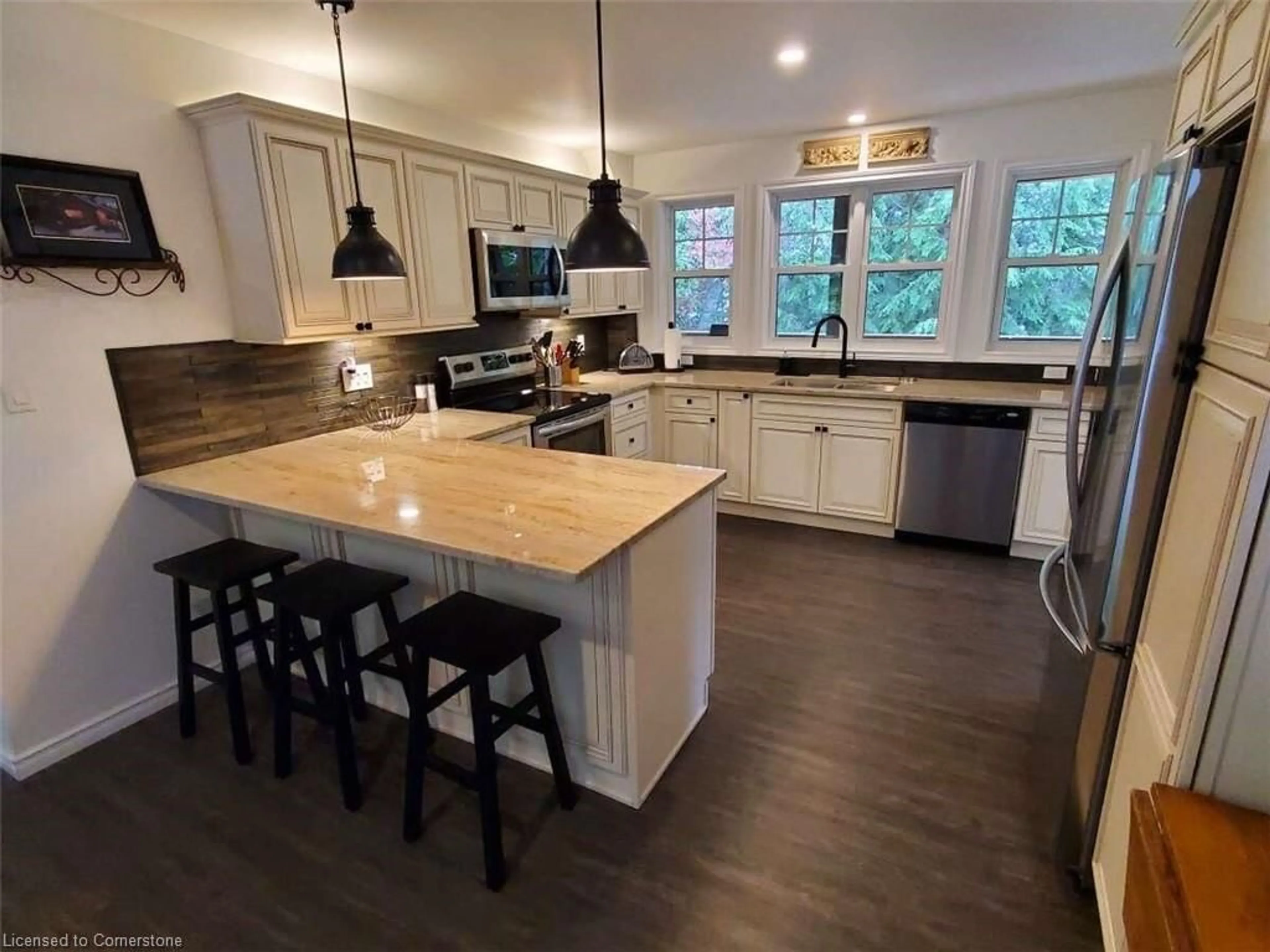 Open concept kitchen, wood/laminate floor for 22 Sunrise Bay Rd, Elliot Lake Ontario P5A 2S9