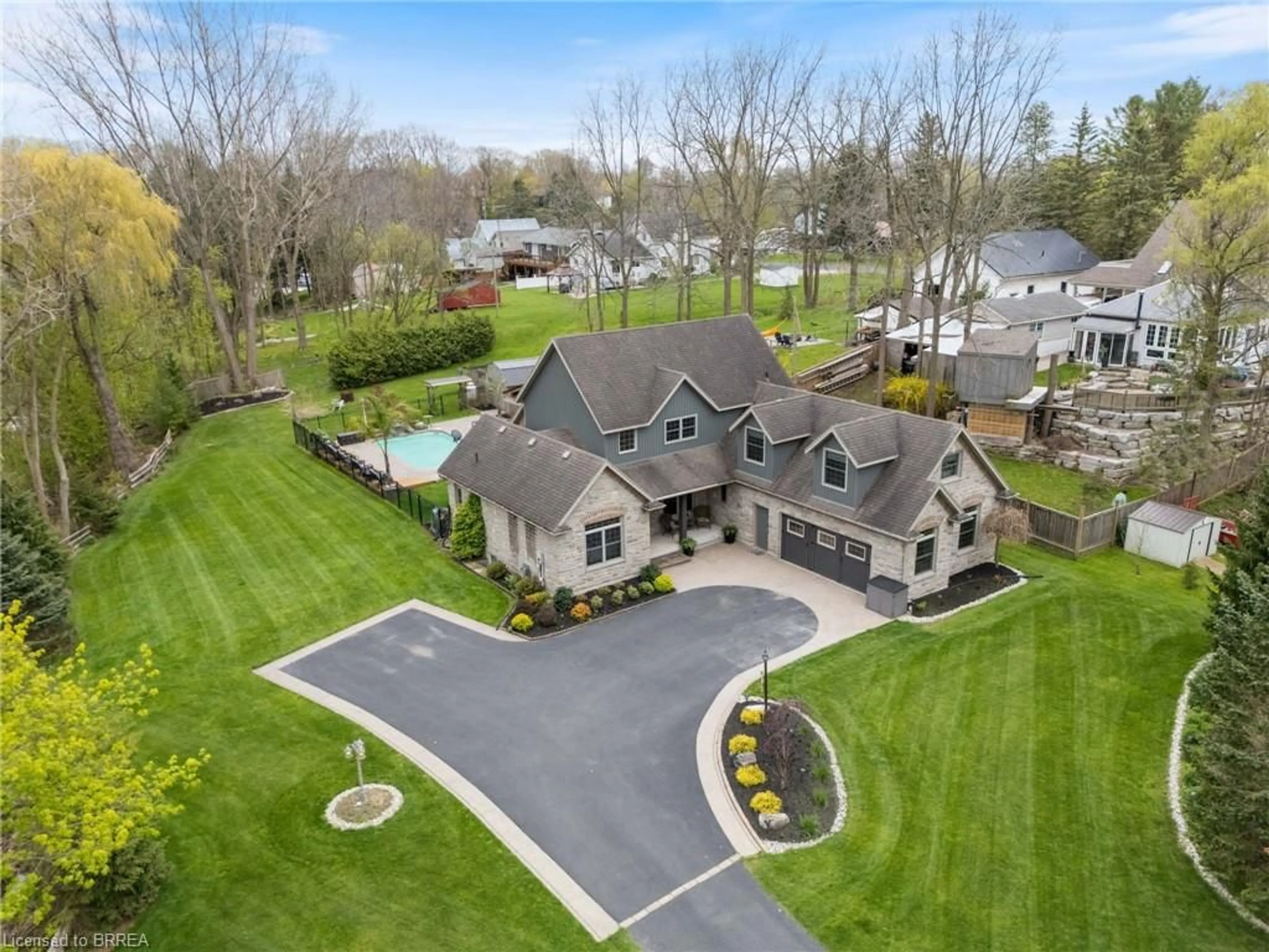 A pic from outside/outdoor area/front of a property/back of a property/a pic from drone, street for 38 Silver Lake Dr, Port Dover Ontario N0A 1N6
