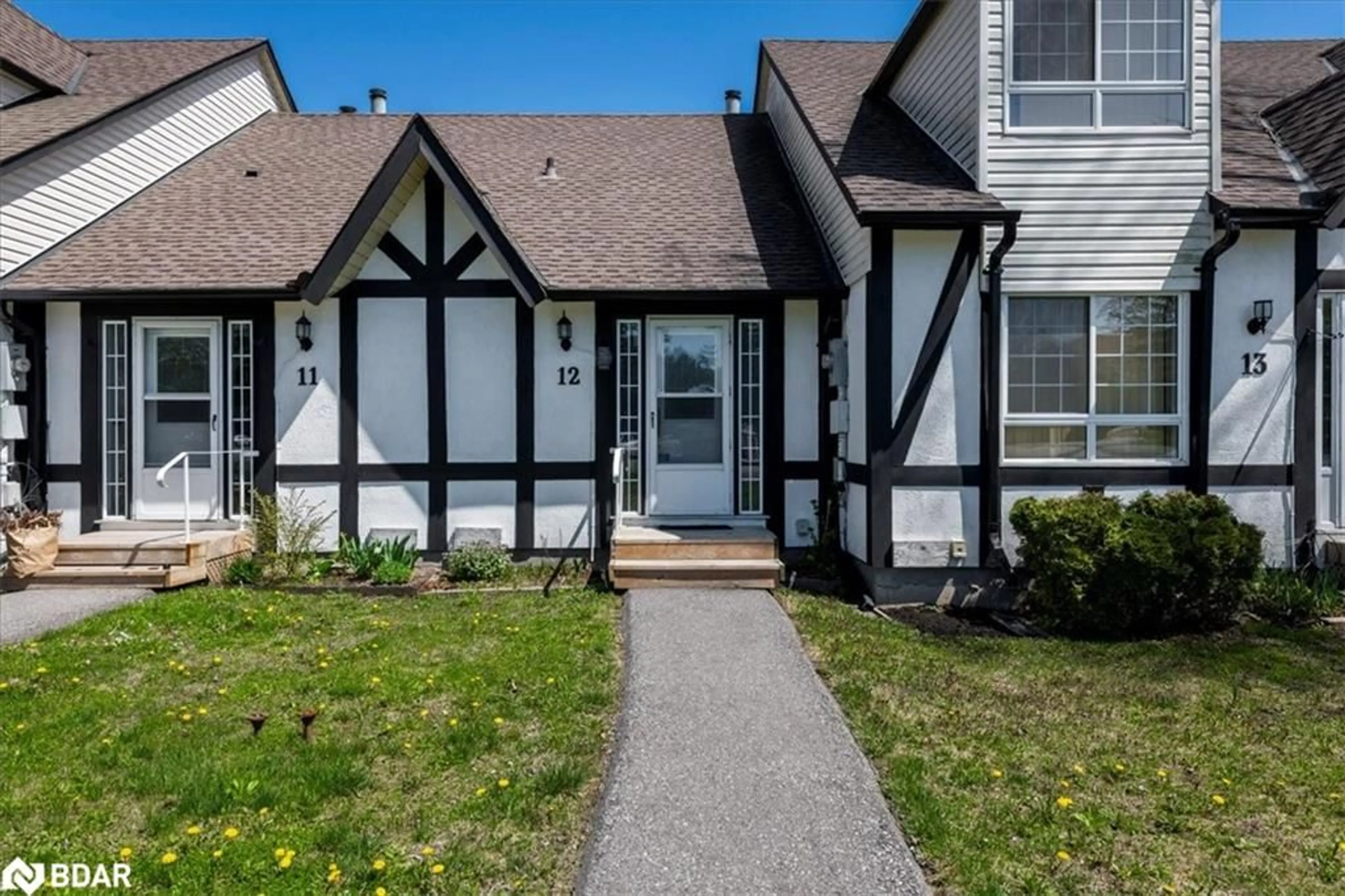 Home with vinyl exterior material, street for 81 Laguna Parkway Pky #12, Brechin Ontario L0K 1B0