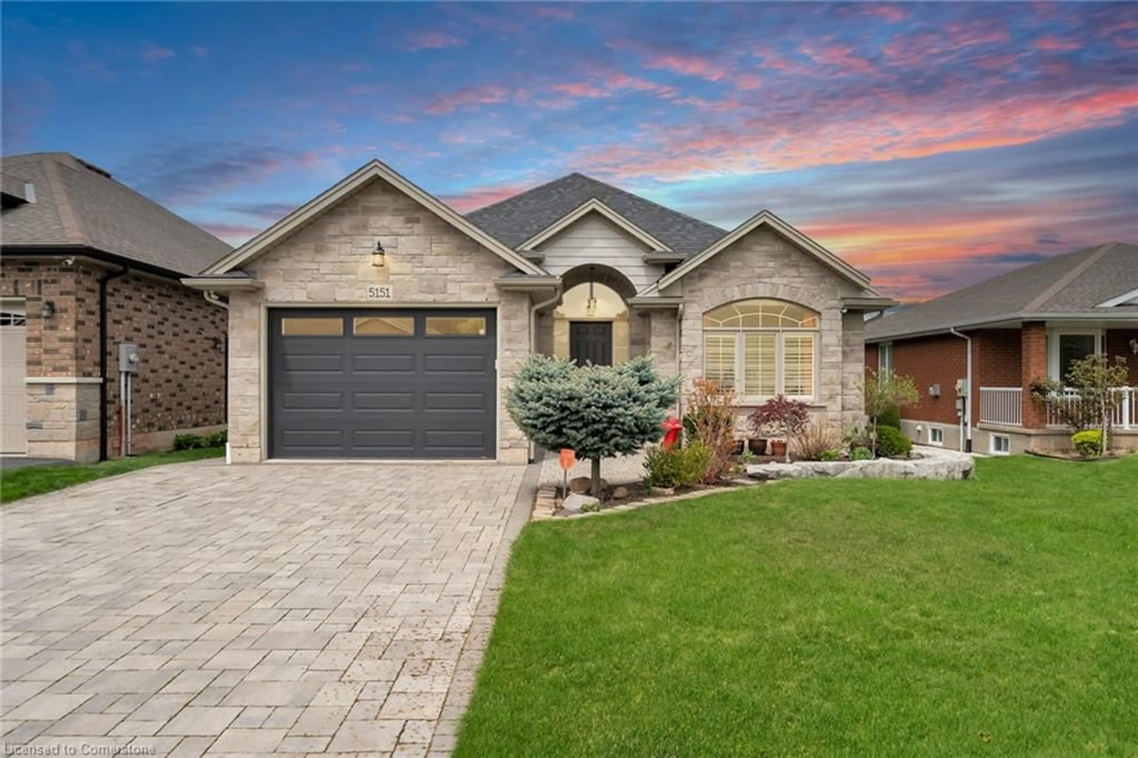 Home with brick exterior material, street for 5151 Meadowood Lane, Beamsville Ontario L3J 0J8