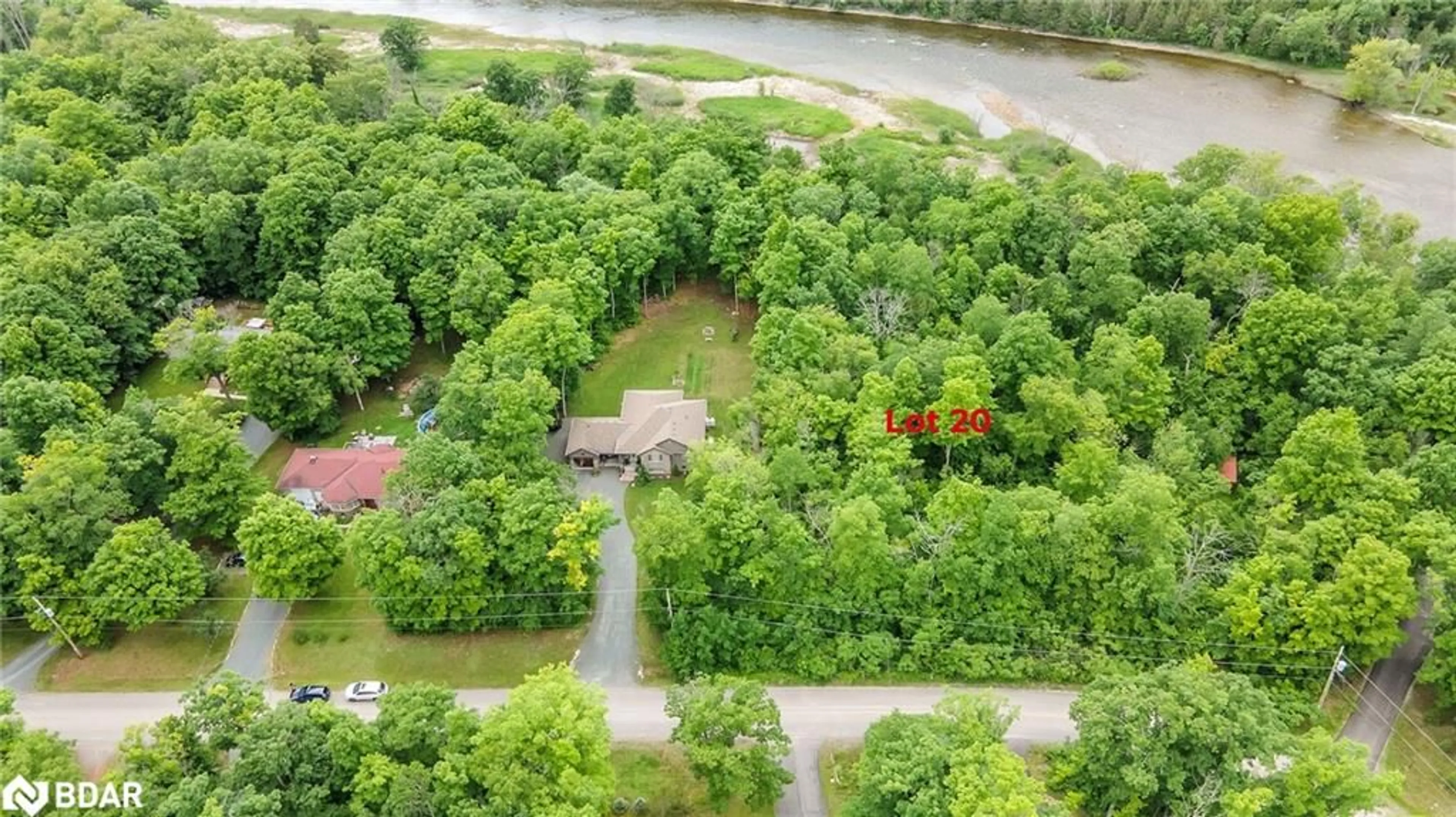 A pic from outside/outdoor area/front of a property/back of a property/a pic from drone, water/lake/river/ocean view for 20 Riverside Drive Dr, Campbellford Ontario K0K 1L0