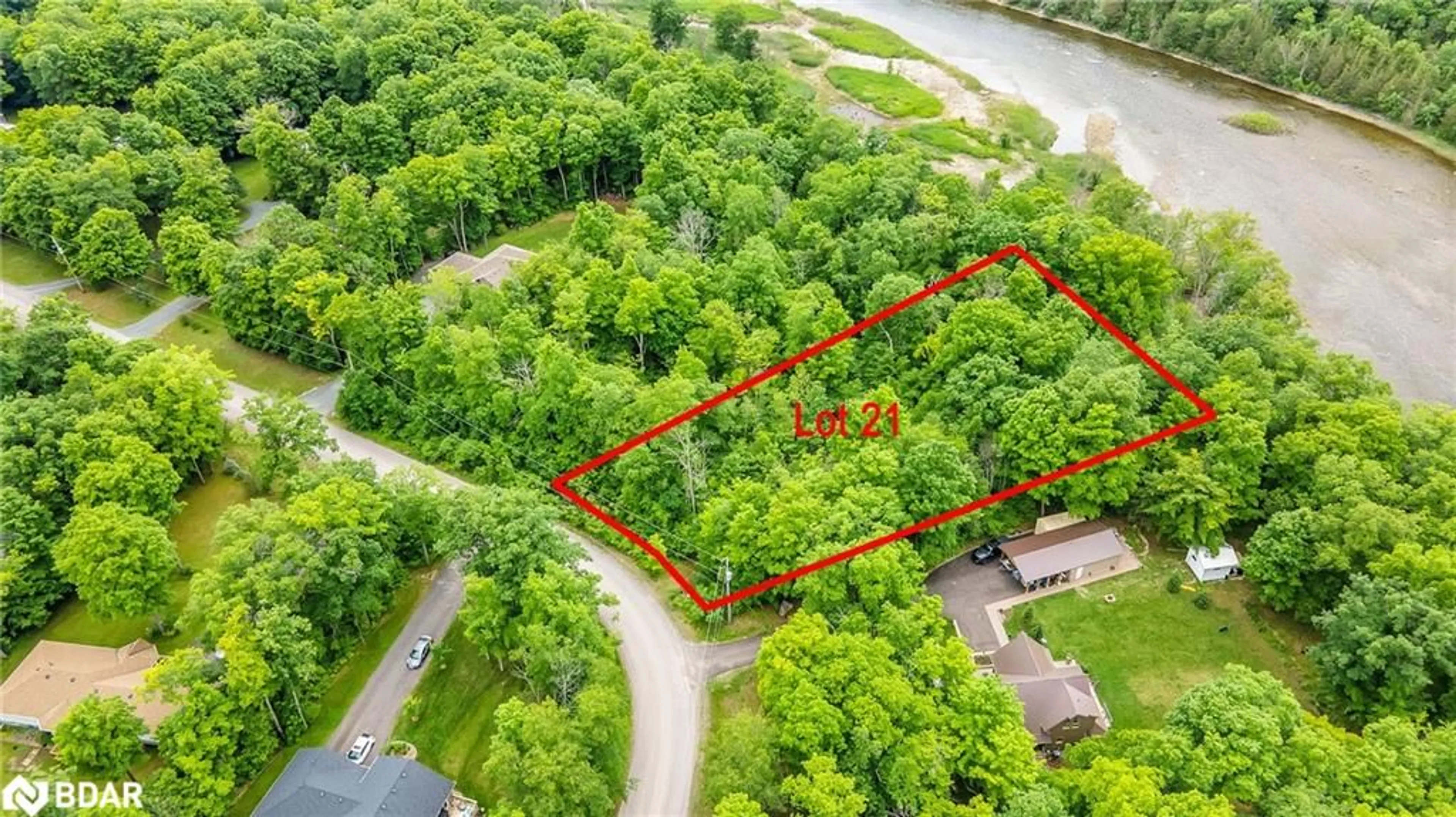 A pic from outside/outdoor area/front of a property/back of a property/a pic from drone, water/lake/river/ocean view for 21 Riverside Drive Dr, Campbellford Ontario K0K 1L0