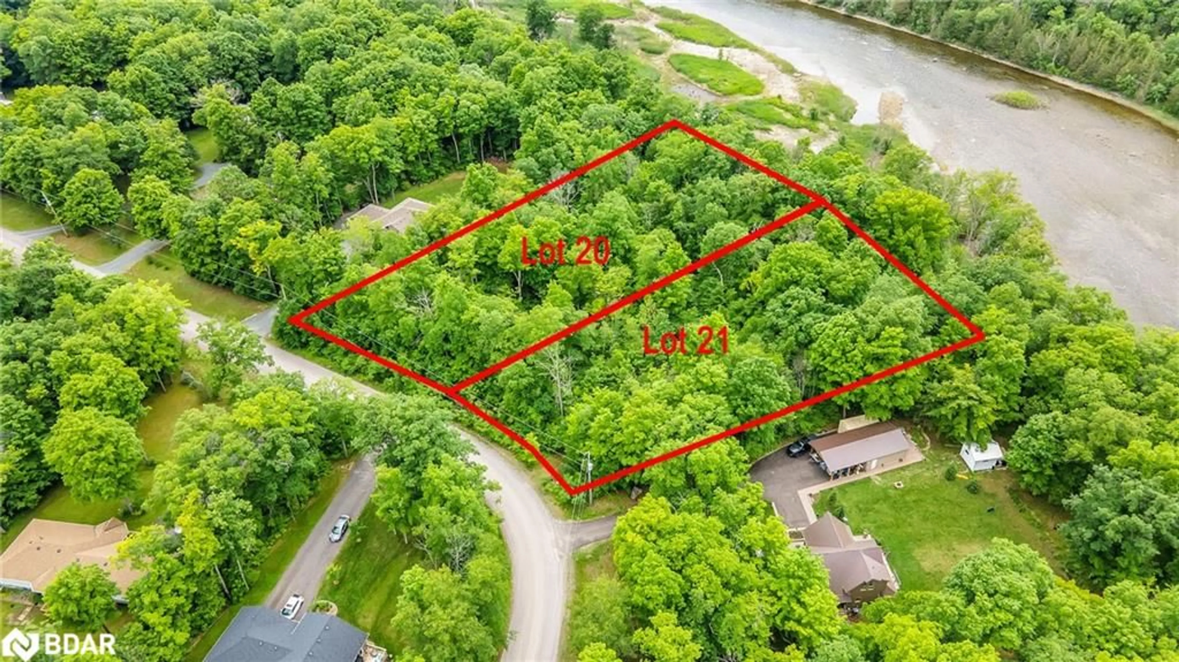 A pic from outside/outdoor area/front of a property/back of a property/a pic from drone, water/lake/river/ocean view for 21 Riverside Drive Dr, Campbellford Ontario K0K 1L0