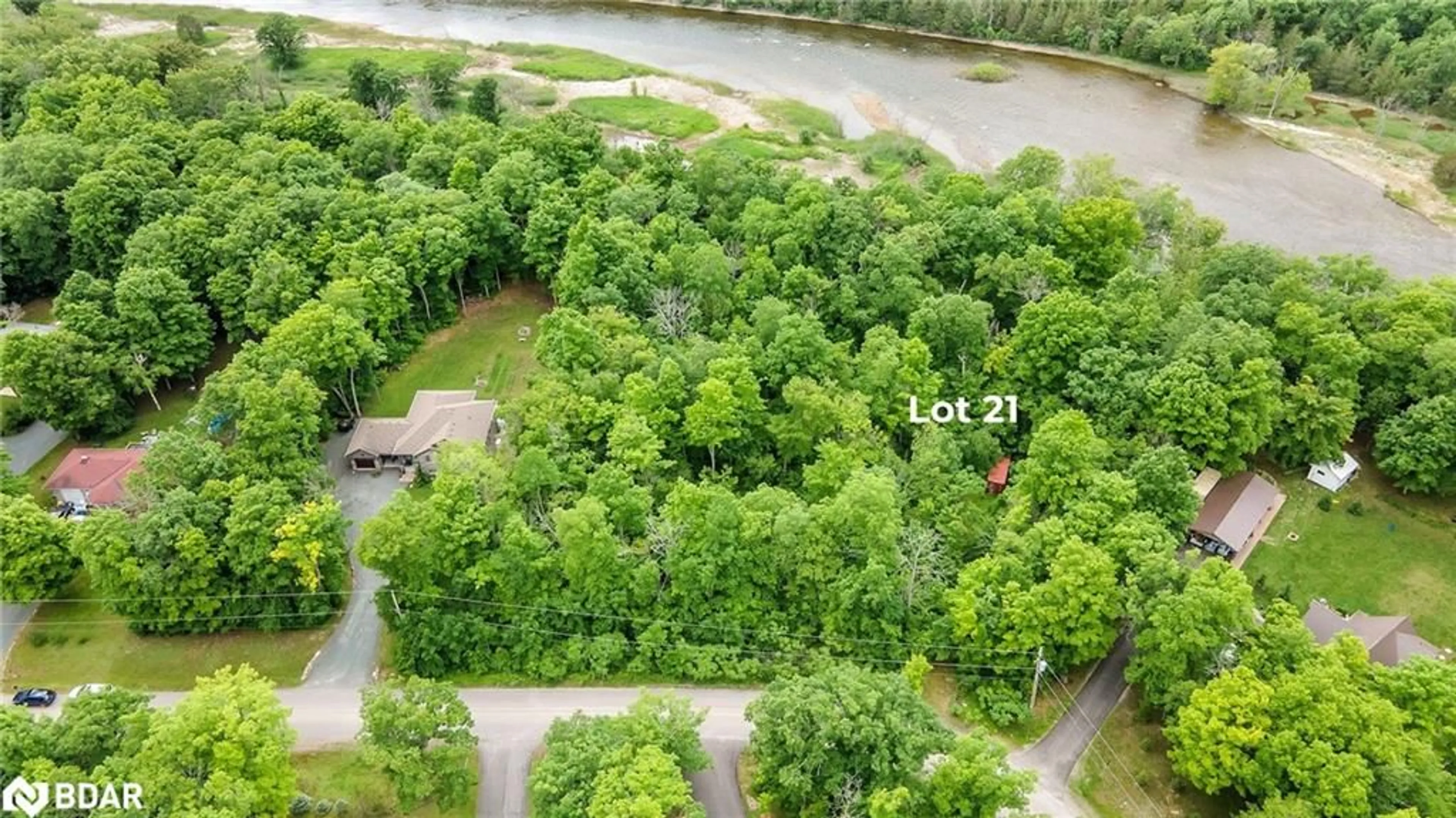 A pic from outside/outdoor area/front of a property/back of a property/a pic from drone, water/lake/river/ocean view for 21 Riverside Drive Dr, Campbellford Ontario K0K 1L0