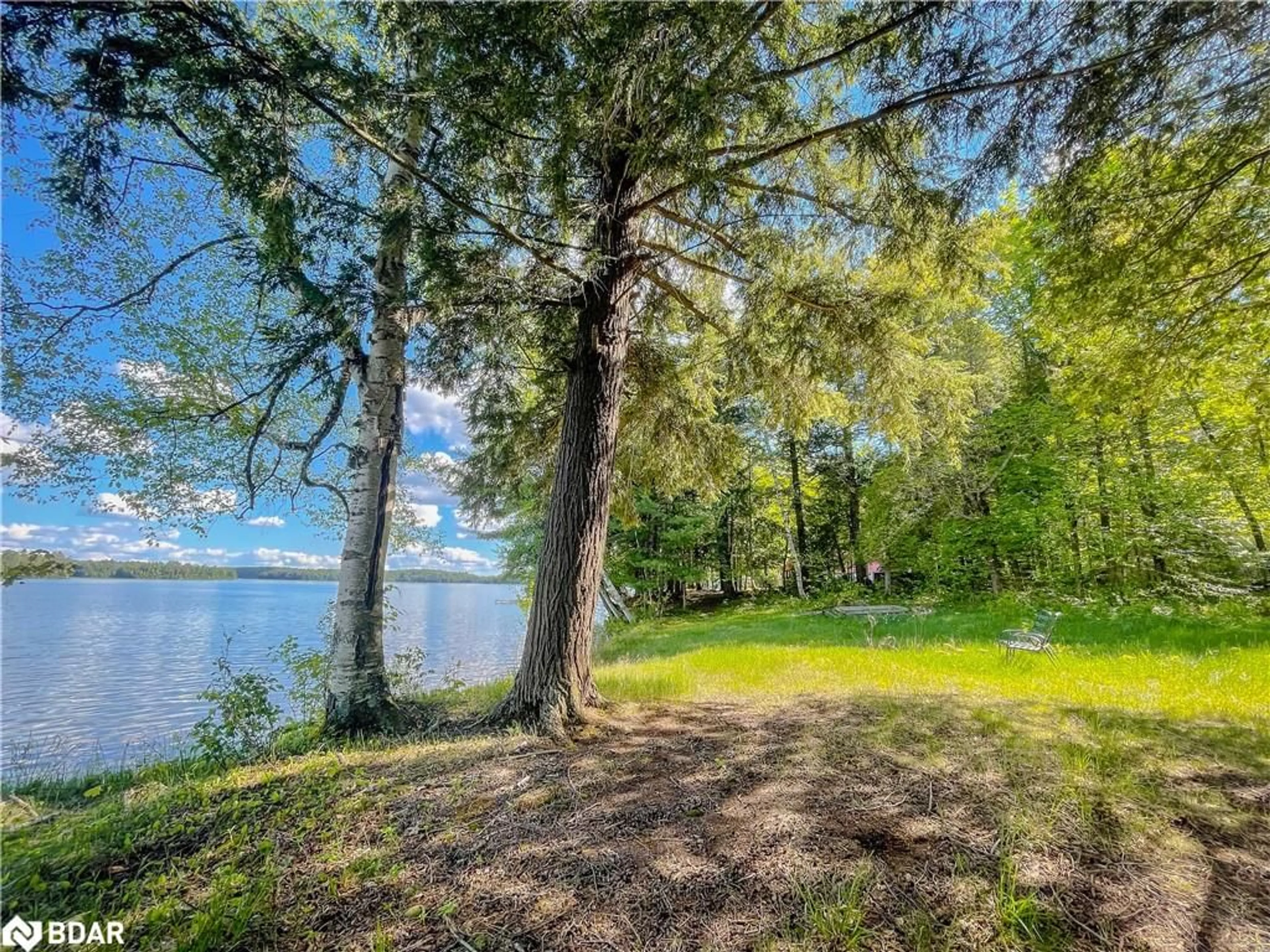 A pic from outside/outdoor area/front of a property/back of a property/a pic from drone, water/lake/river/ocean view for 127 Blind Line, Armour Ontario P0A 1C0