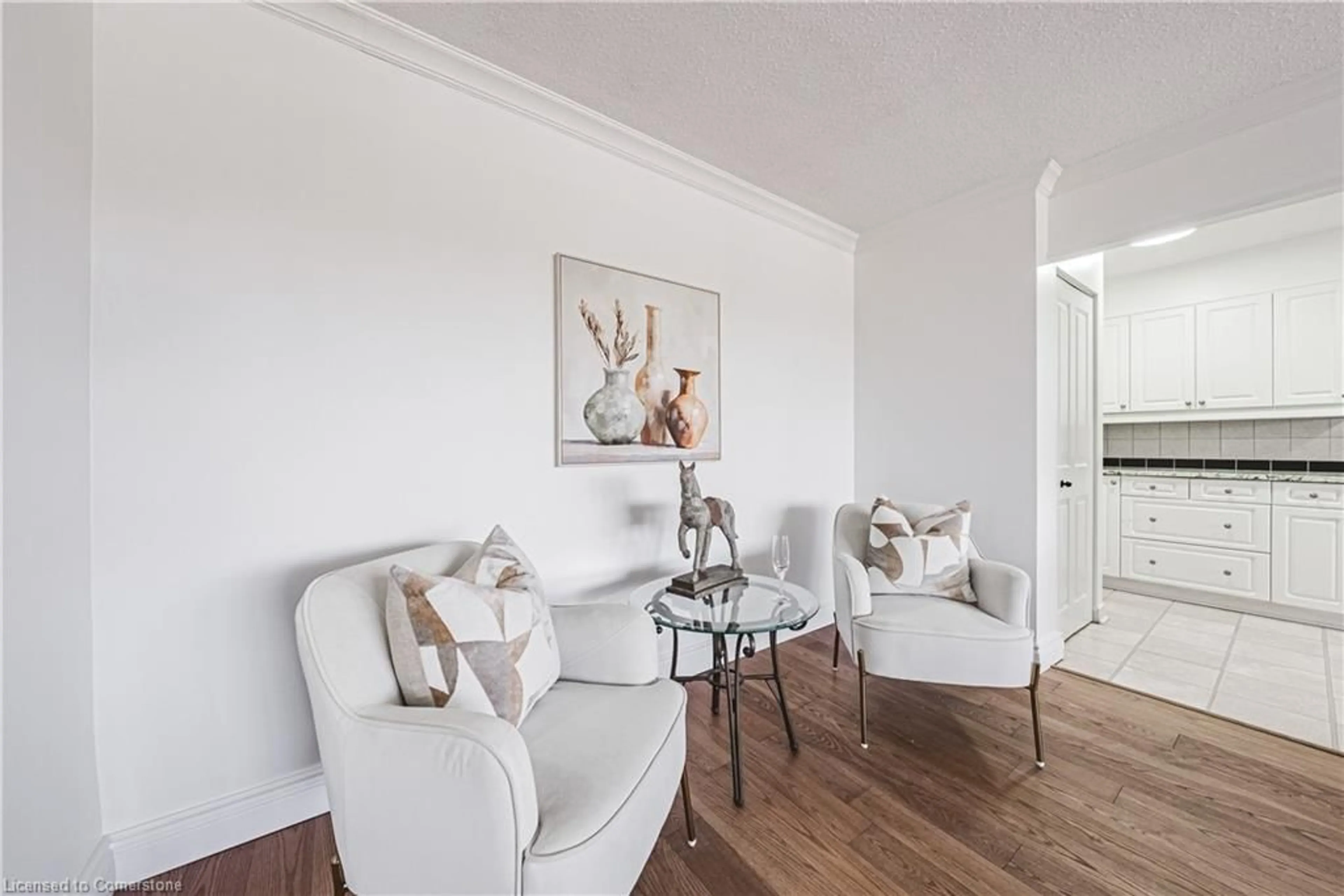 Living room with furniture, wood/laminate floor for 2055 Upper Middle Rd #509, Burlington Ontario L7P 3P4