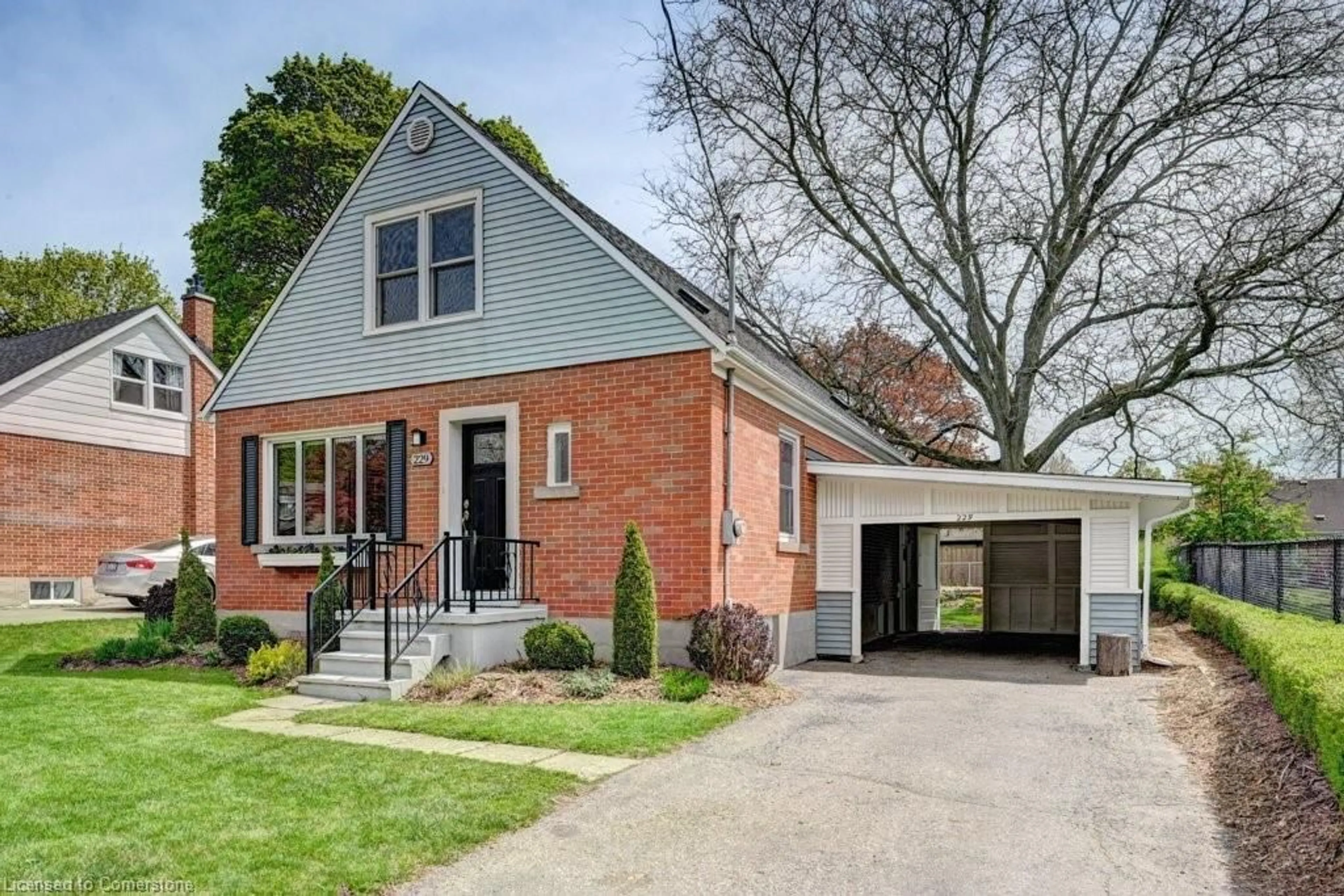 Home with brick exterior material, street for 229 Neilson Ave, Waterloo Ontario N2J 2M2