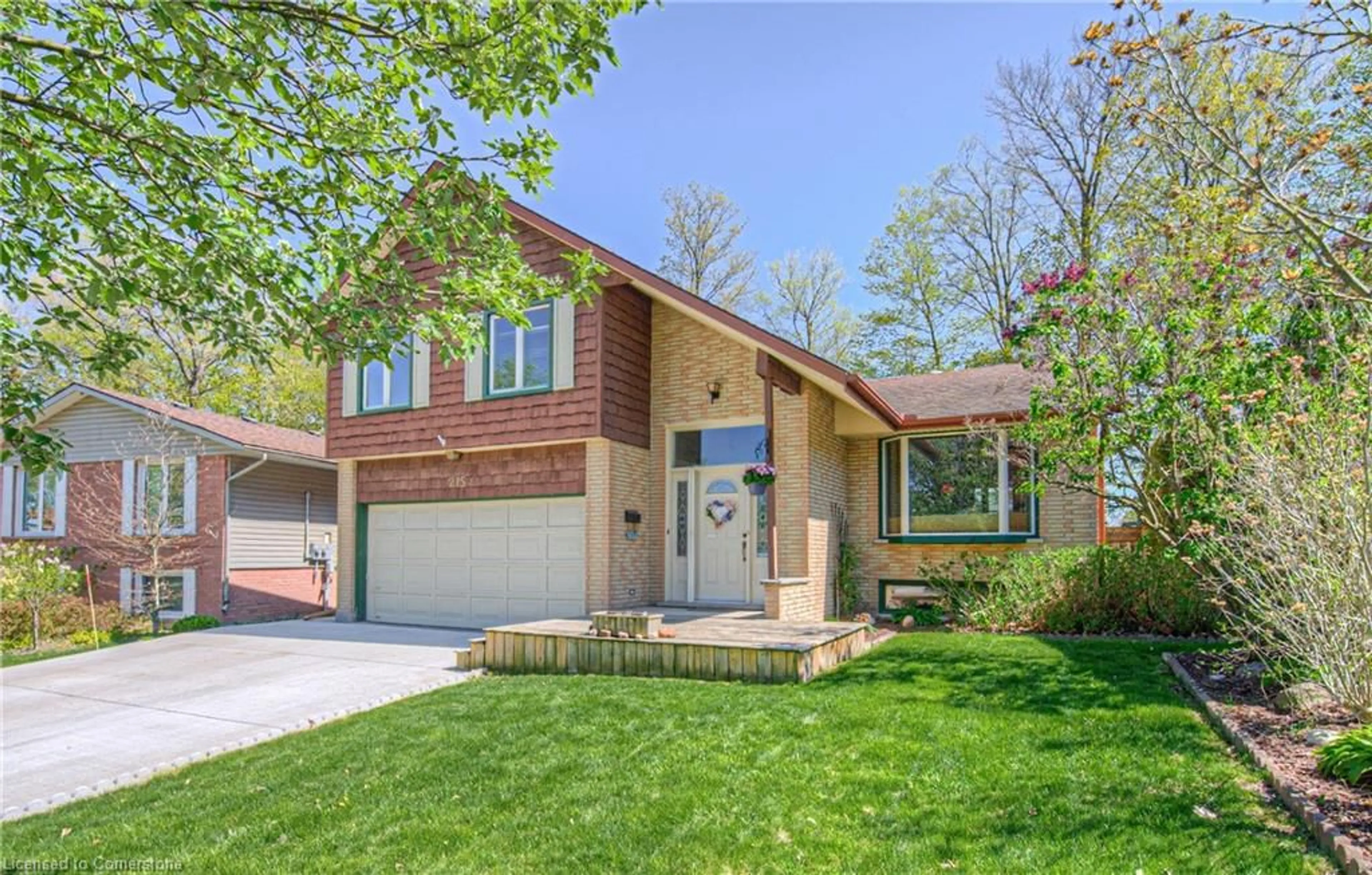 Home with vinyl exterior material, street for 215 Southwood Dr, Kitchener Ontario N2E 2B2