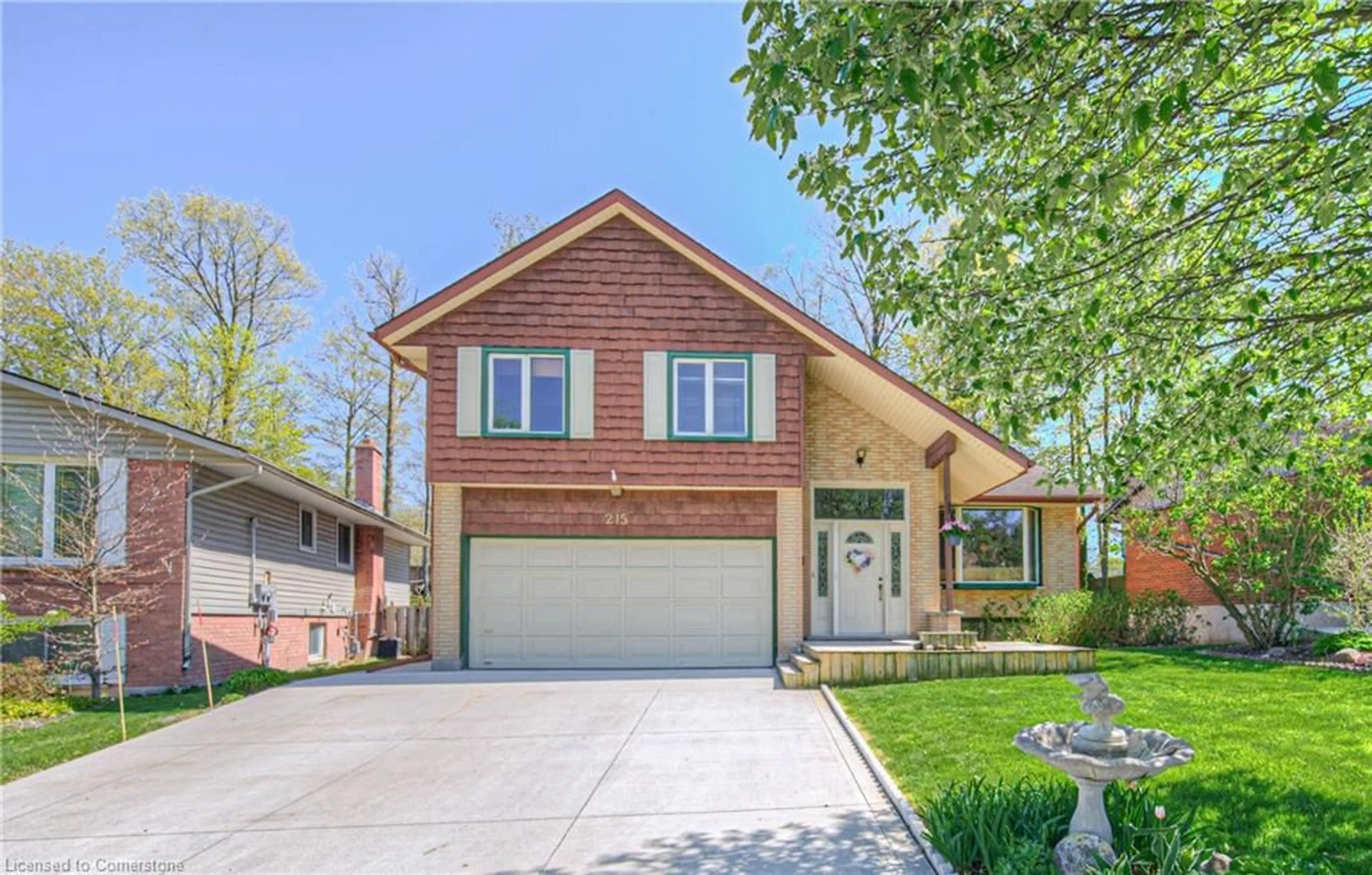 Home with brick exterior material, street for 215 Southwood Dr, Kitchener Ontario N2E 2B2