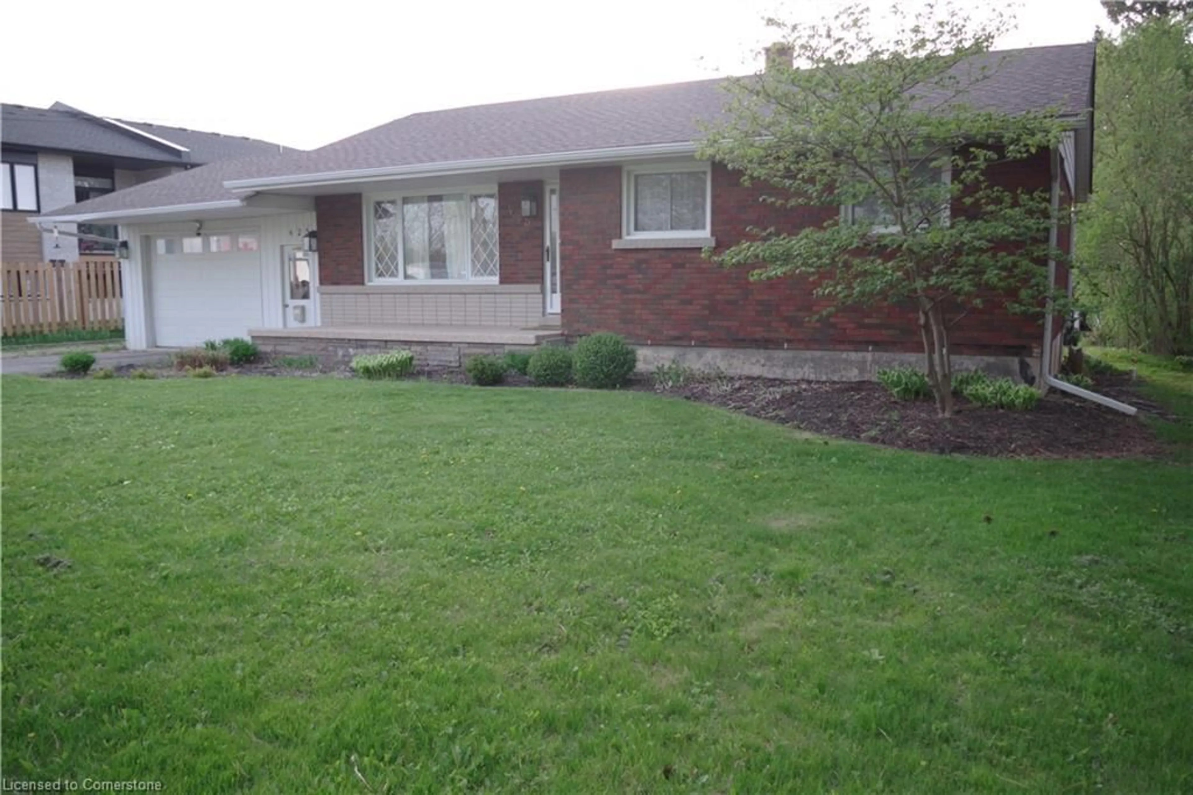Home with brick exterior material, street for 425 Wellington St, Mount Forest Ontario N0G 2L2