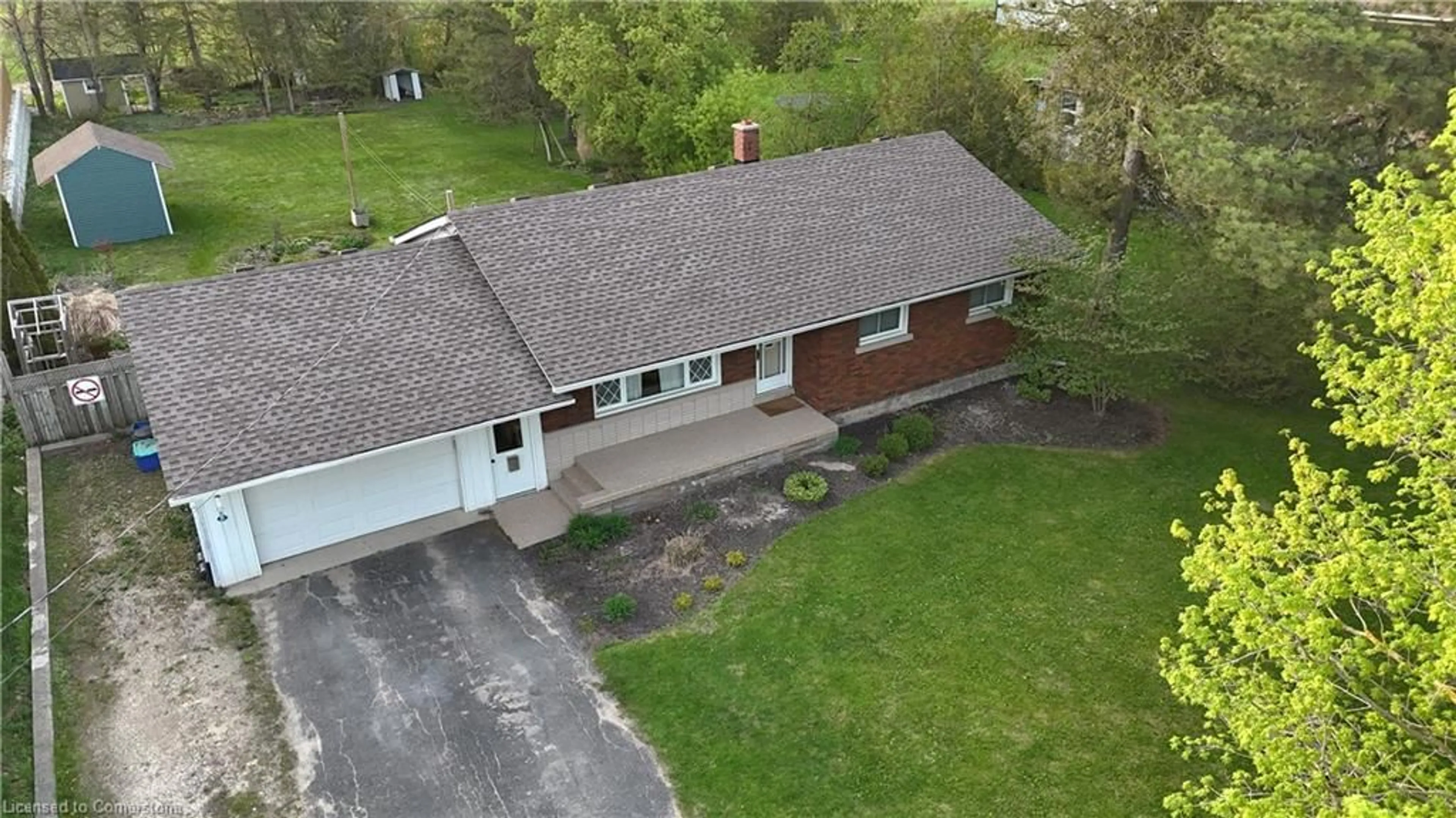 A pic from outside/outdoor area/front of a property/back of a property/a pic from drone, street for 425 Wellington St, Mount Forest Ontario N0G 2L2