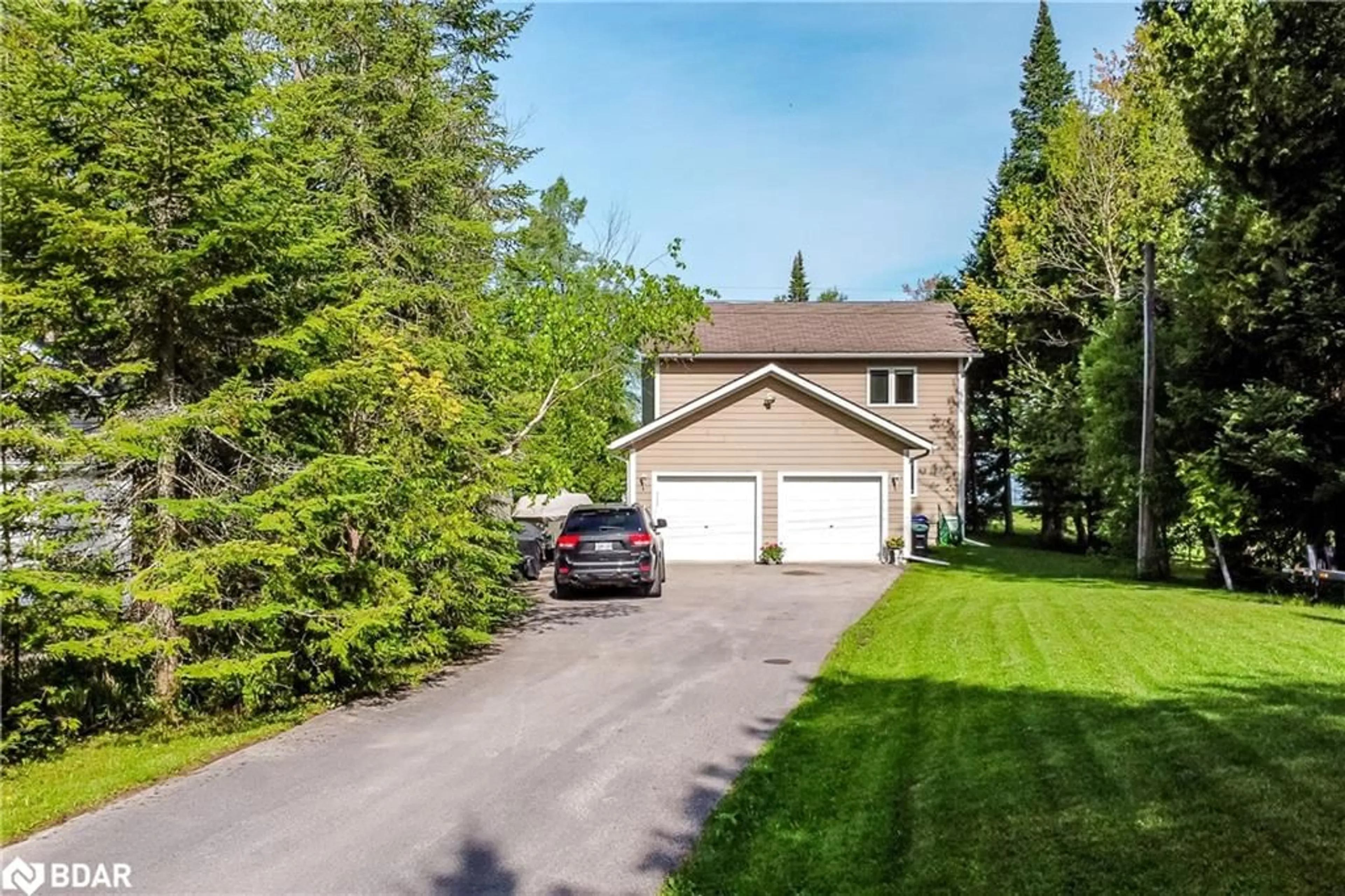 A pic from outside/outdoor area/front of a property/back of a property/a pic from drone, street for 10 Buttercup Lane Lane, Orr Lake Ontario L0L 1P0