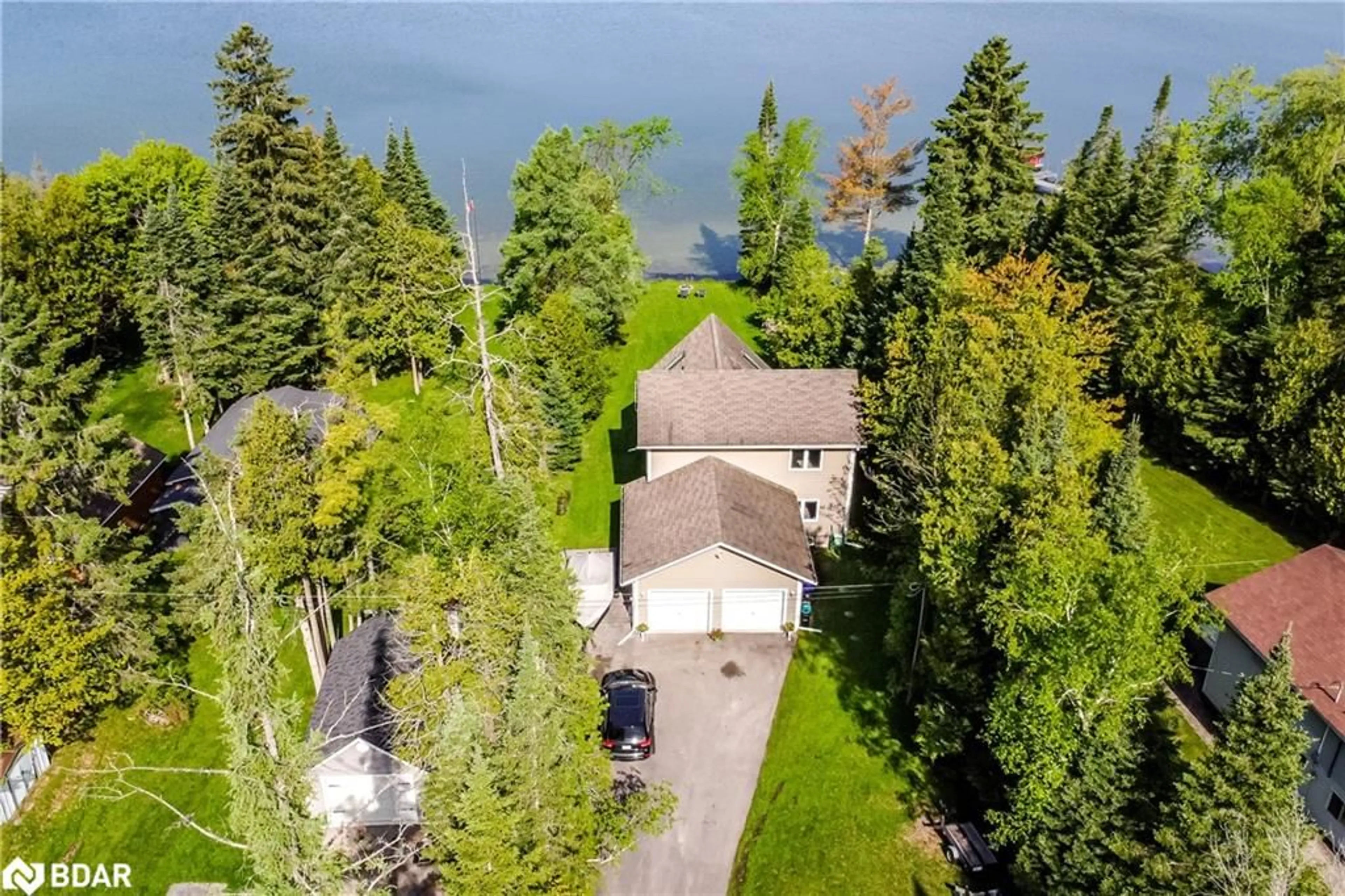 A pic from outside/outdoor area/front of a property/back of a property/a pic from drone, water/lake/river/ocean view for 10 Buttercup Lane Lane, Orr Lake Ontario L0L 1P0