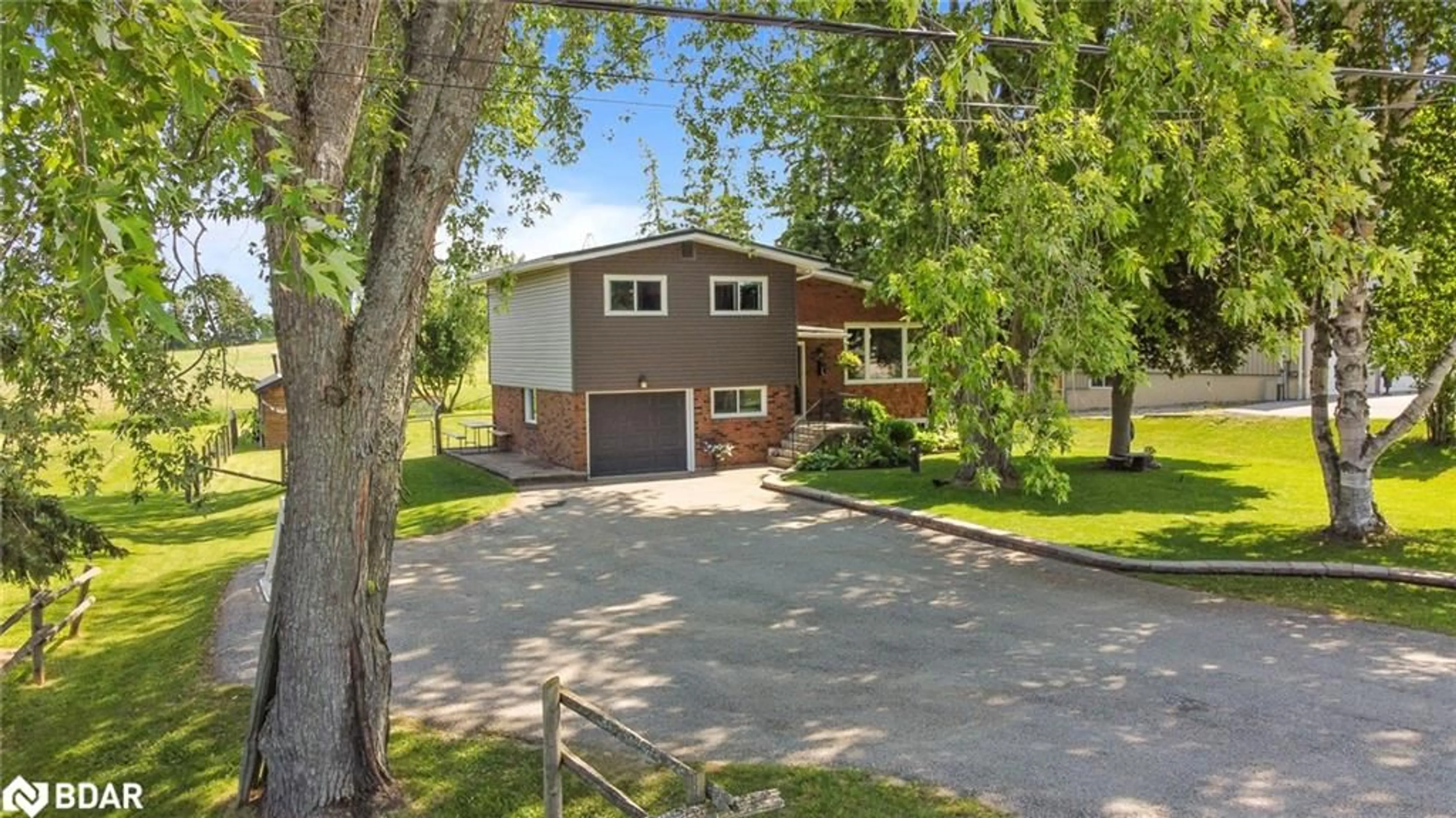 A pic from outside/outdoor area/front of a property/back of a property/a pic from drone, street for 1619 Killarney Beach Rd, Lefroy Ontario L0L 1W0