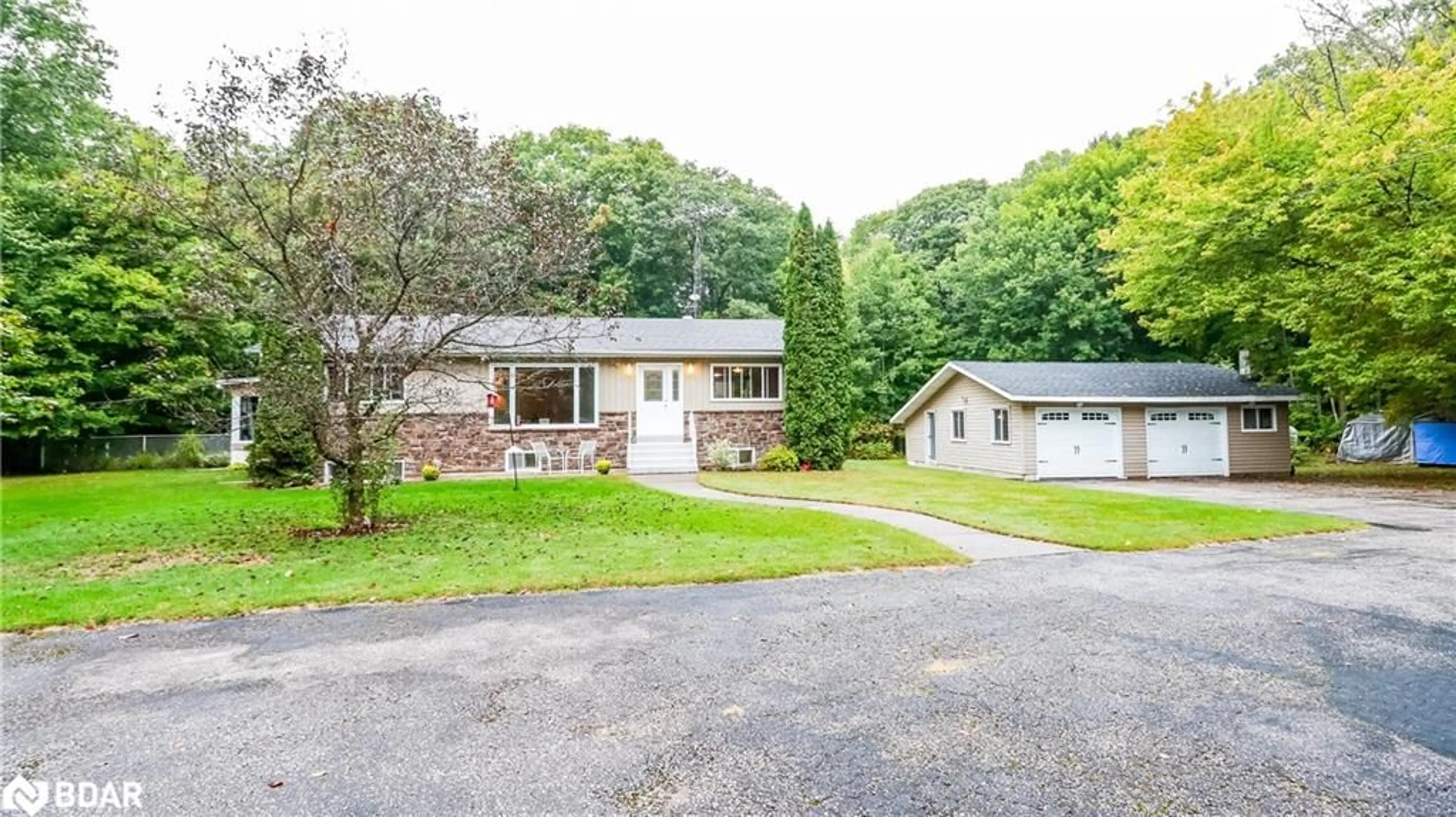 A pic from outside/outdoor area/front of a property/back of a property/a pic from drone, street for 350 Concession 5 W, Tiny Ontario L0L 2T0