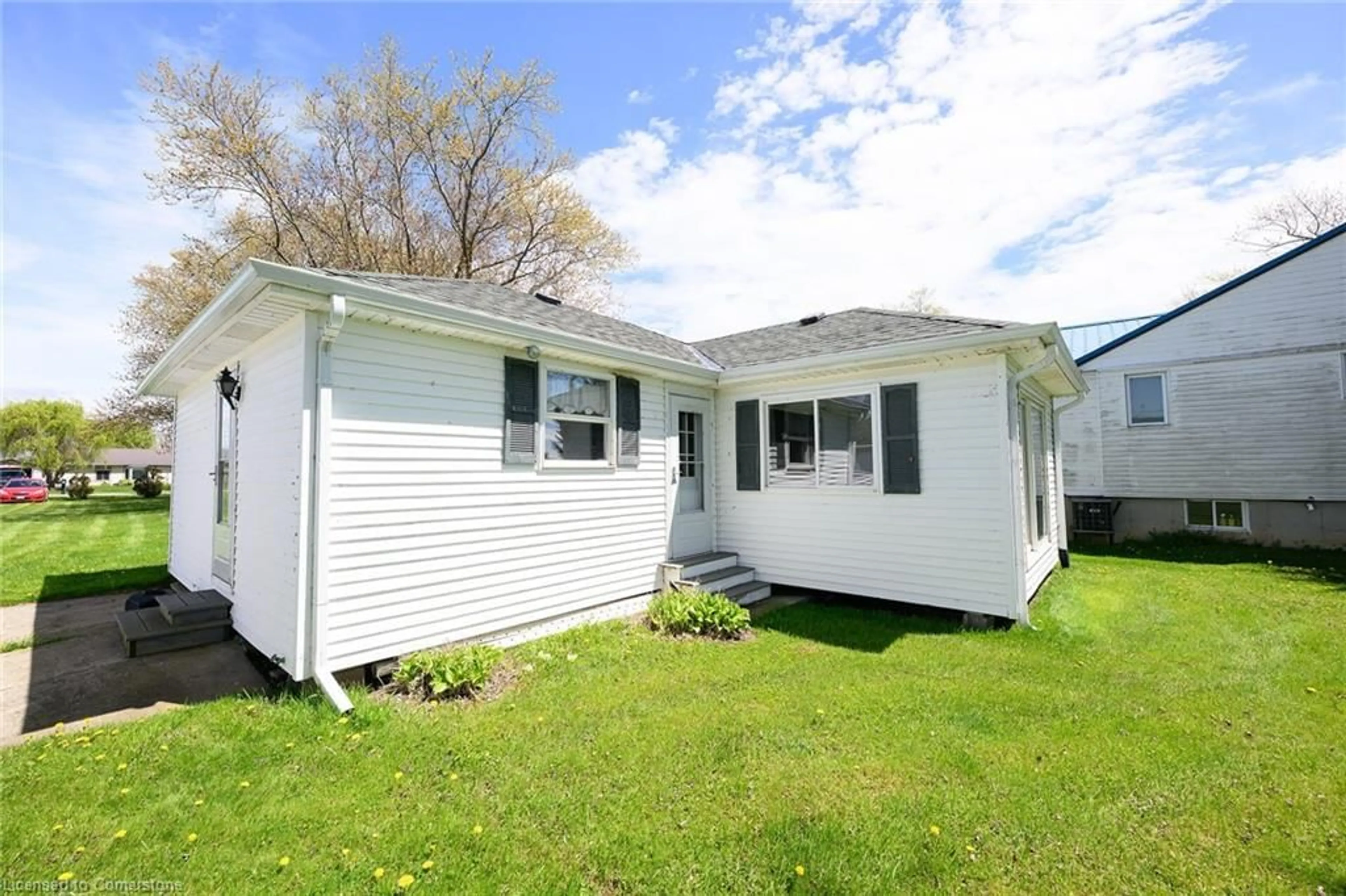 Home with vinyl exterior material, street for 13 Horseshoe Bay Rd, Dunnville Ontario N1A 2W8