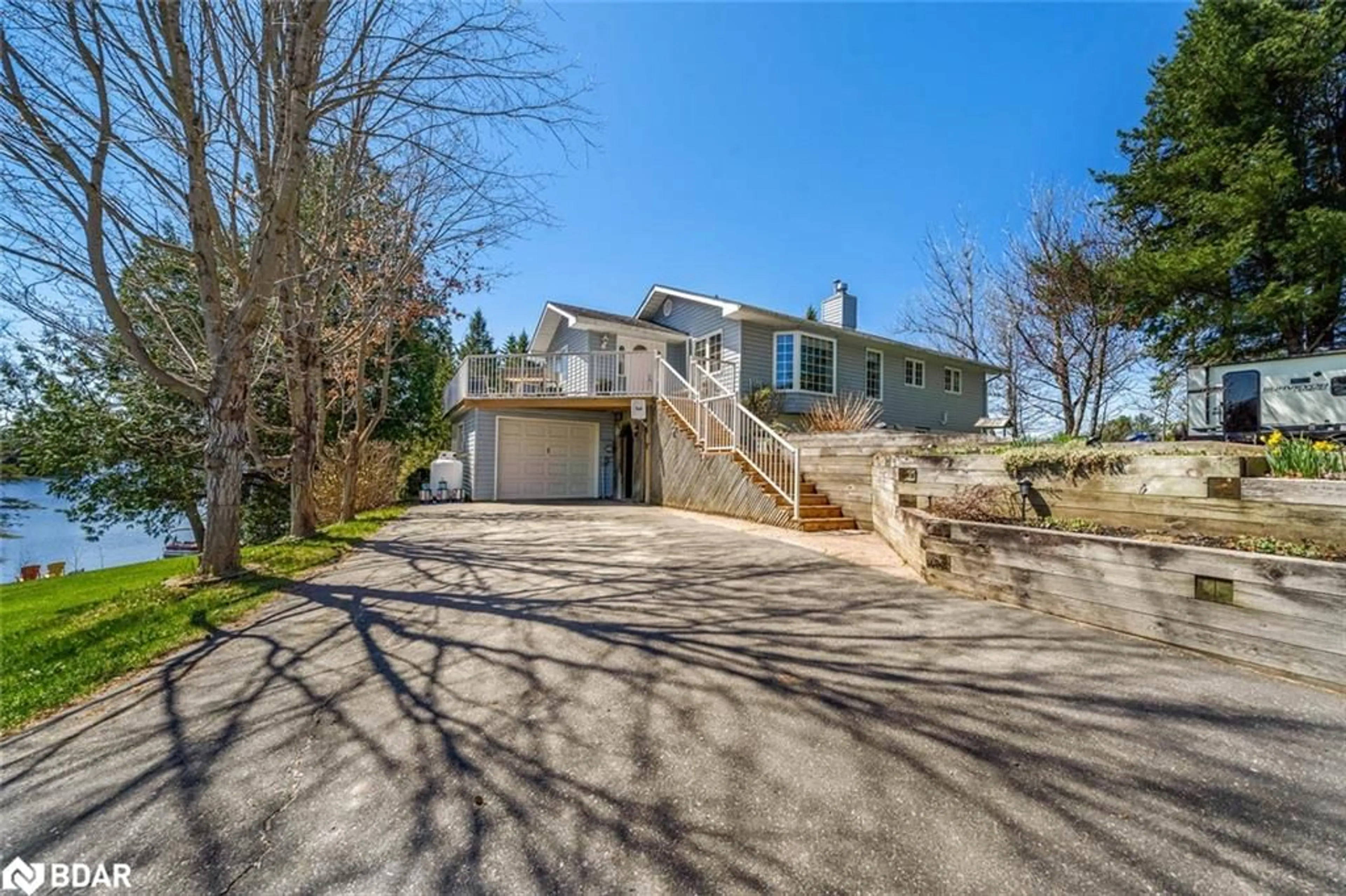 A pic from outside/outdoor area/front of a property/back of a property/a pic from drone, street for 1091 Hwy 518, Seguin Ontario P2A 2W9